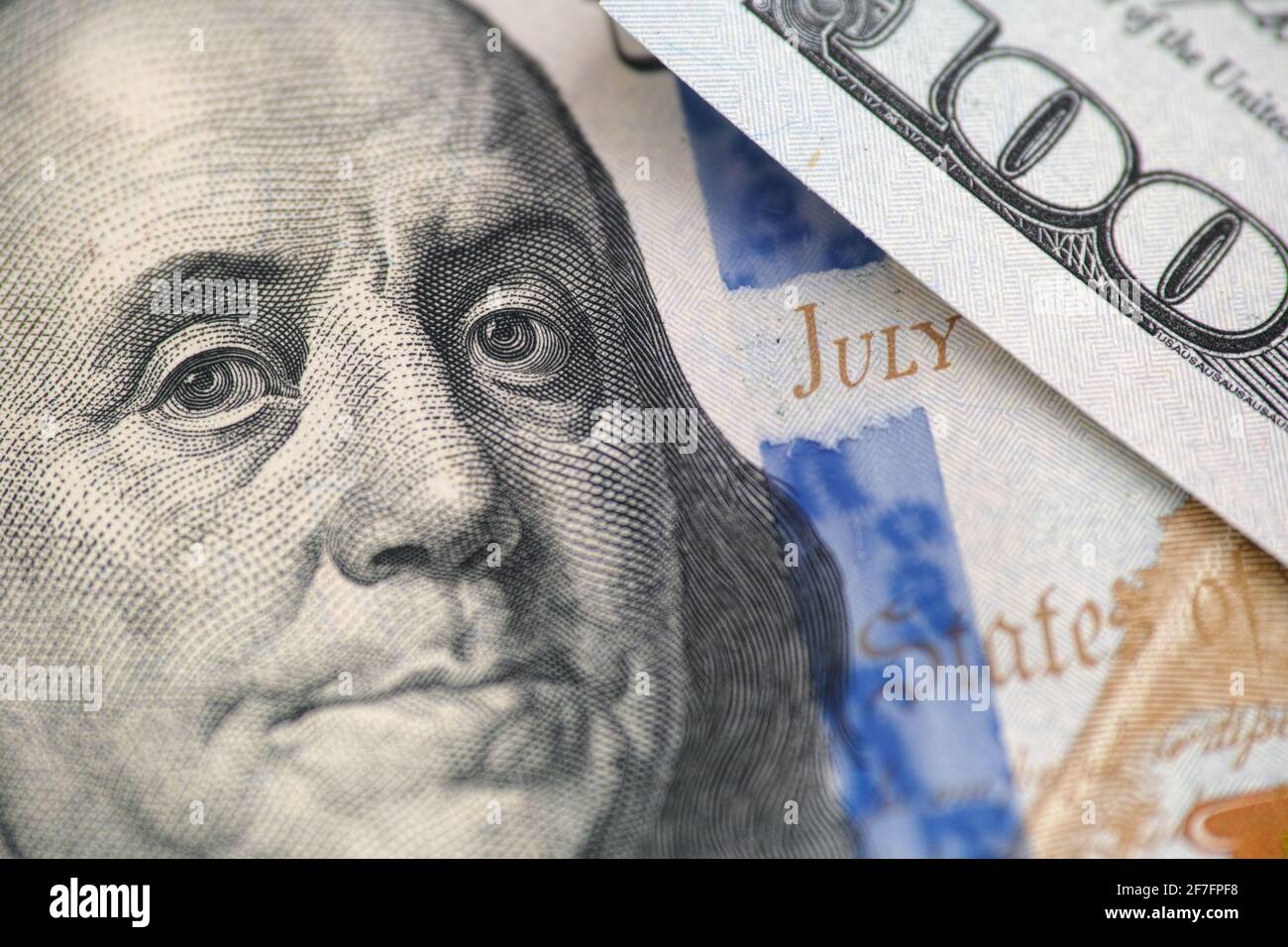 Benjamin franklin on a one hundred dollar bill. Close up. Stock Photo