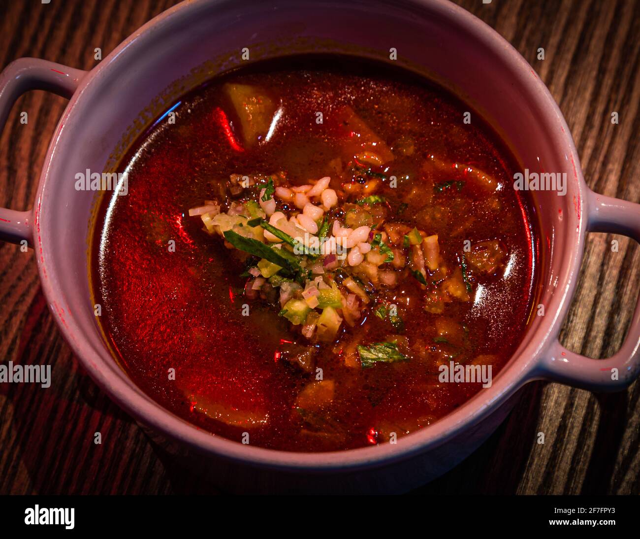 A dish that is also served in the main restaurant “Stand”. Influenced by the Christmas red light lighting, the visual can not keep up with the excellent taste impression that this goulash soup leaves. Budapest, Hungary Stock Photo