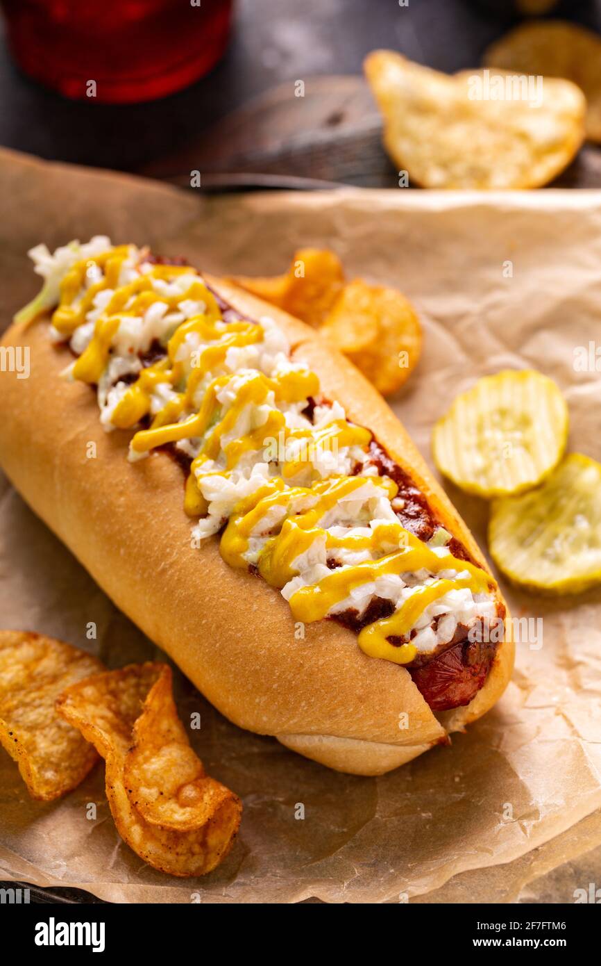 Chili hot dog with onion and mustard Stock Photo Alamy