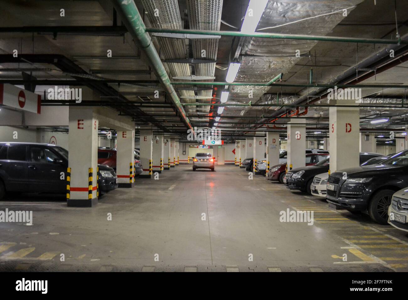 Moscow, Russia, November 2019: Underground car parking on the lower floors of the shopping center. Stock Photo