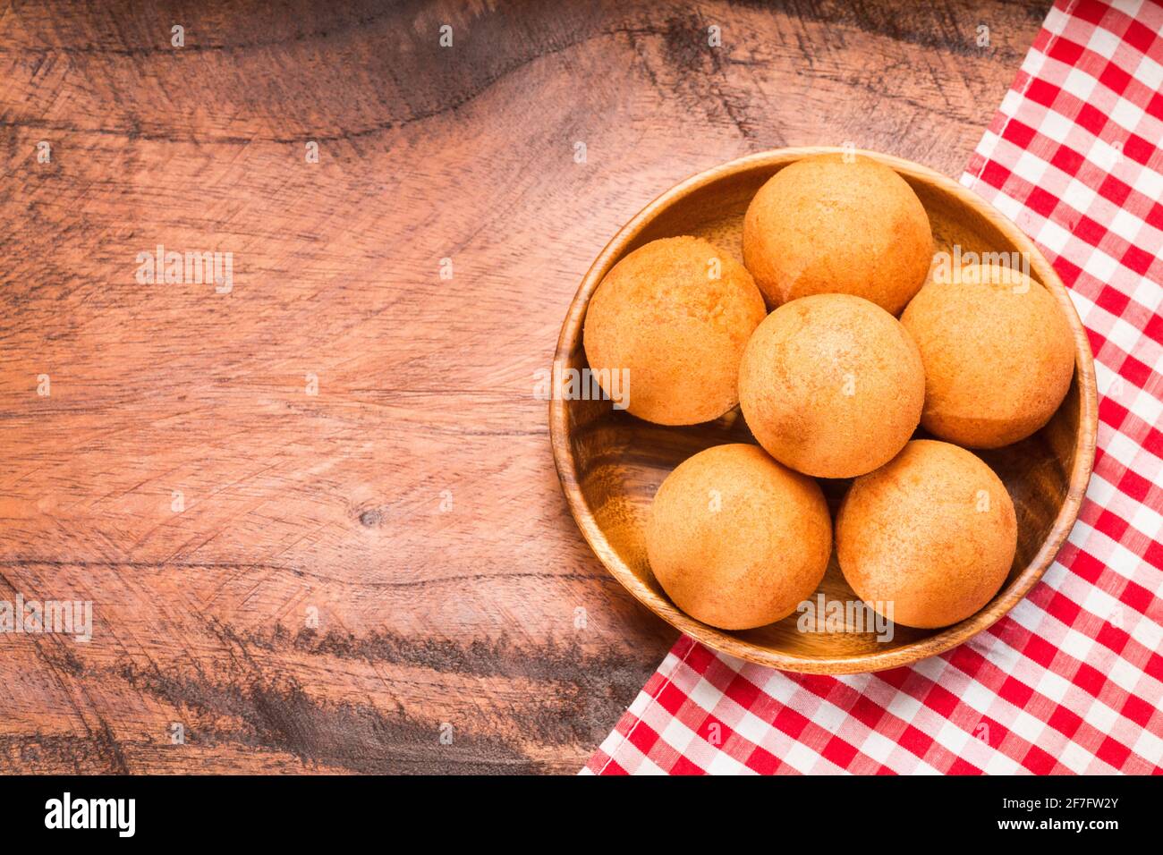Traditional Colombian buñuelo Deep Fried Cheese Bread. space text