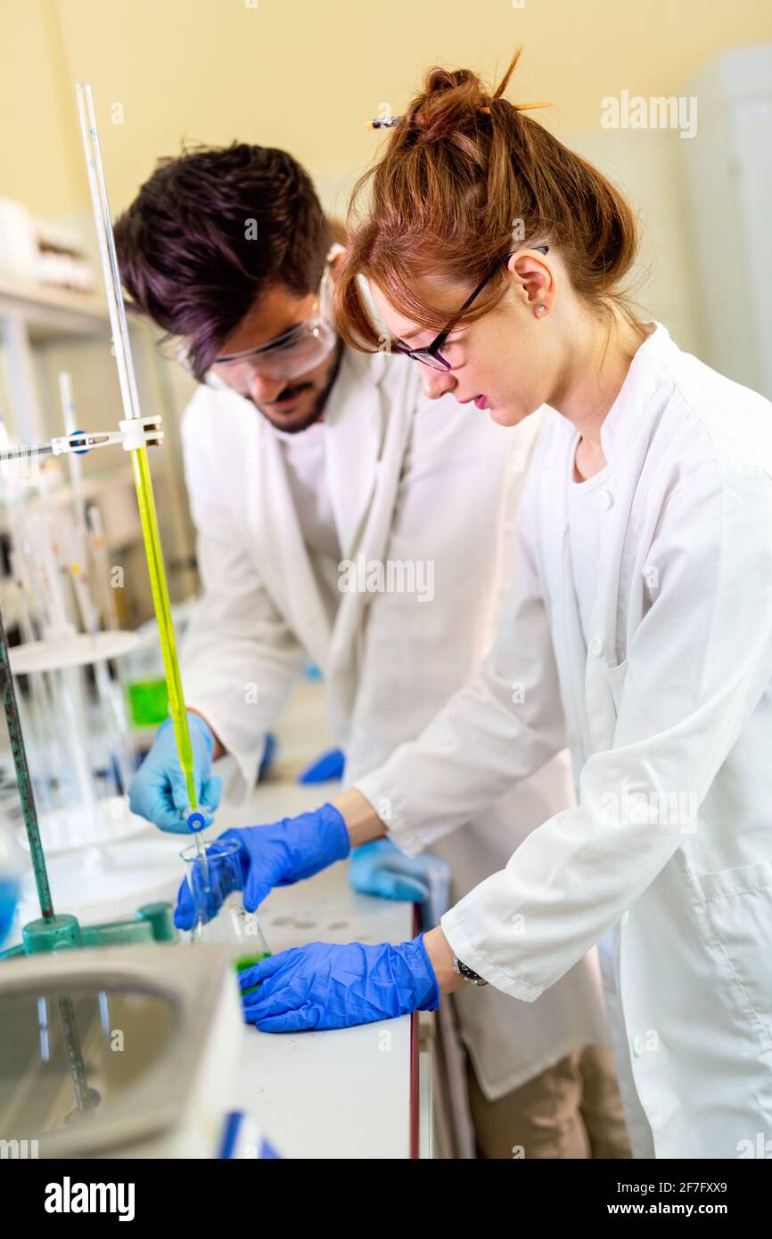 Group of medical scientists working at laboratory. Science, chemistry ...