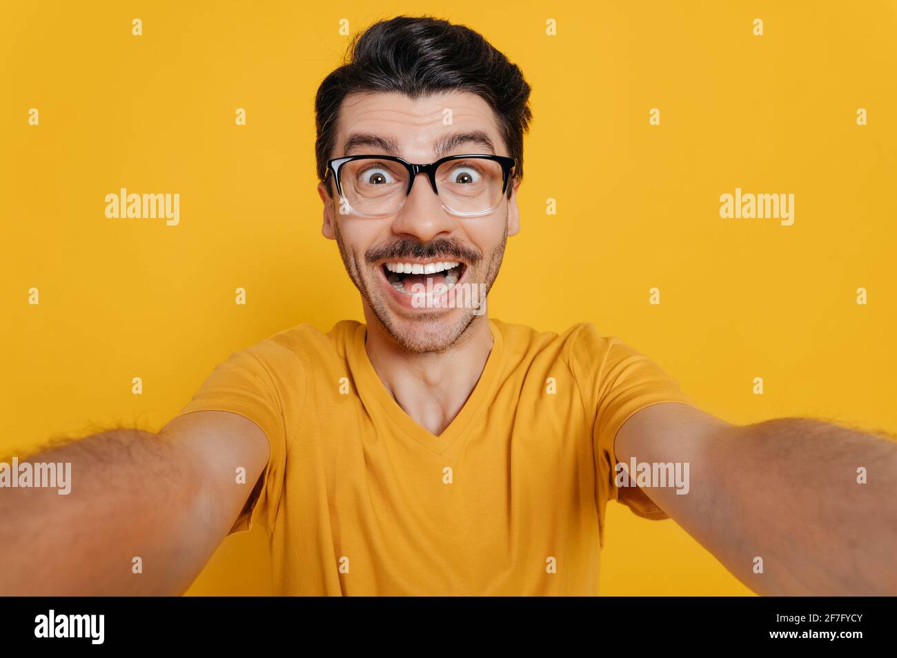 Amazed Caucasian Unshaved Excited Guy With Crazy Gladden Face