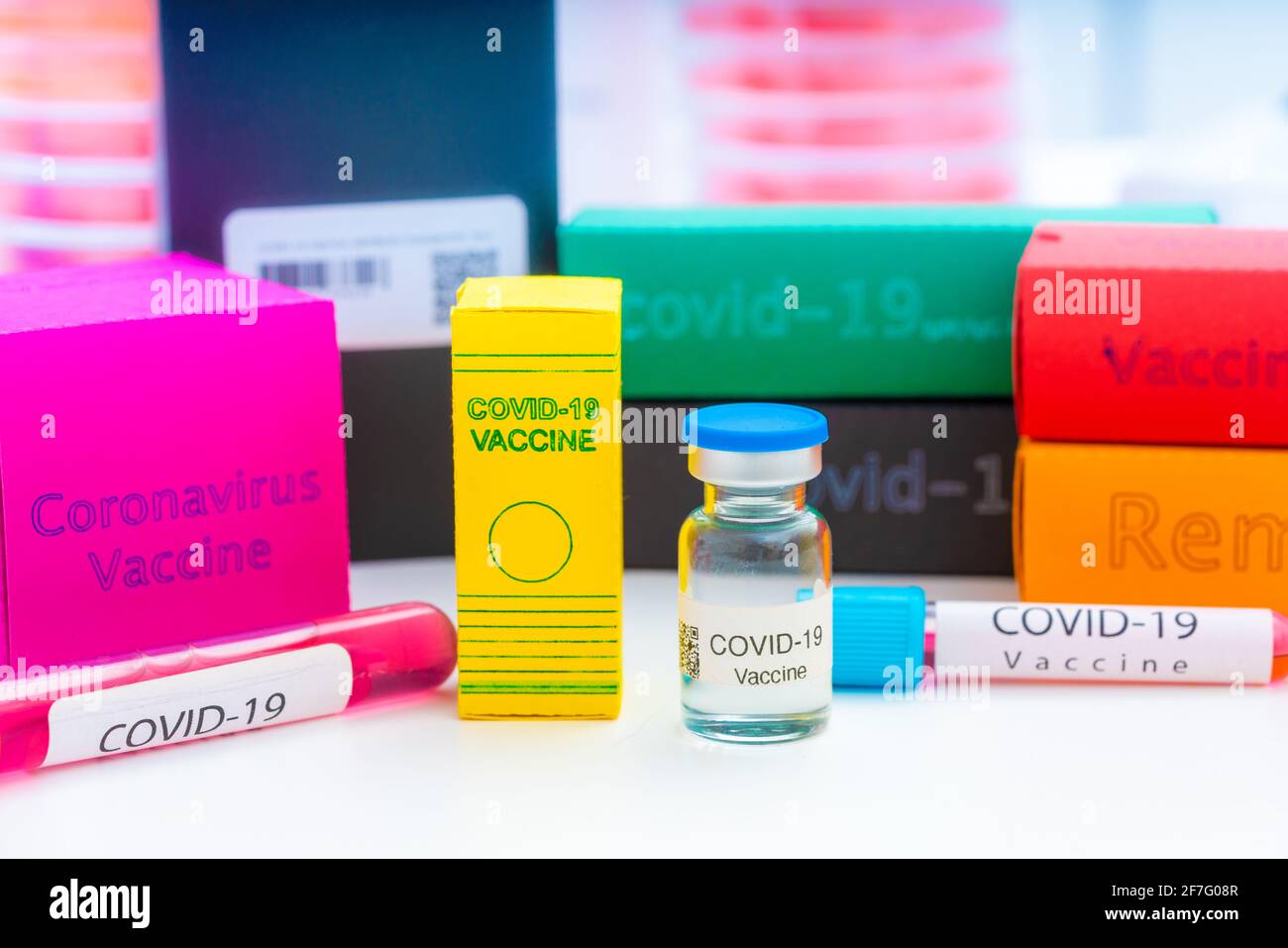 A set of medicines in medical lab for coronavirus NCOV- 19 from PCR test, antibody test, vaccine and remdesivir antiviral drug Stock Photo