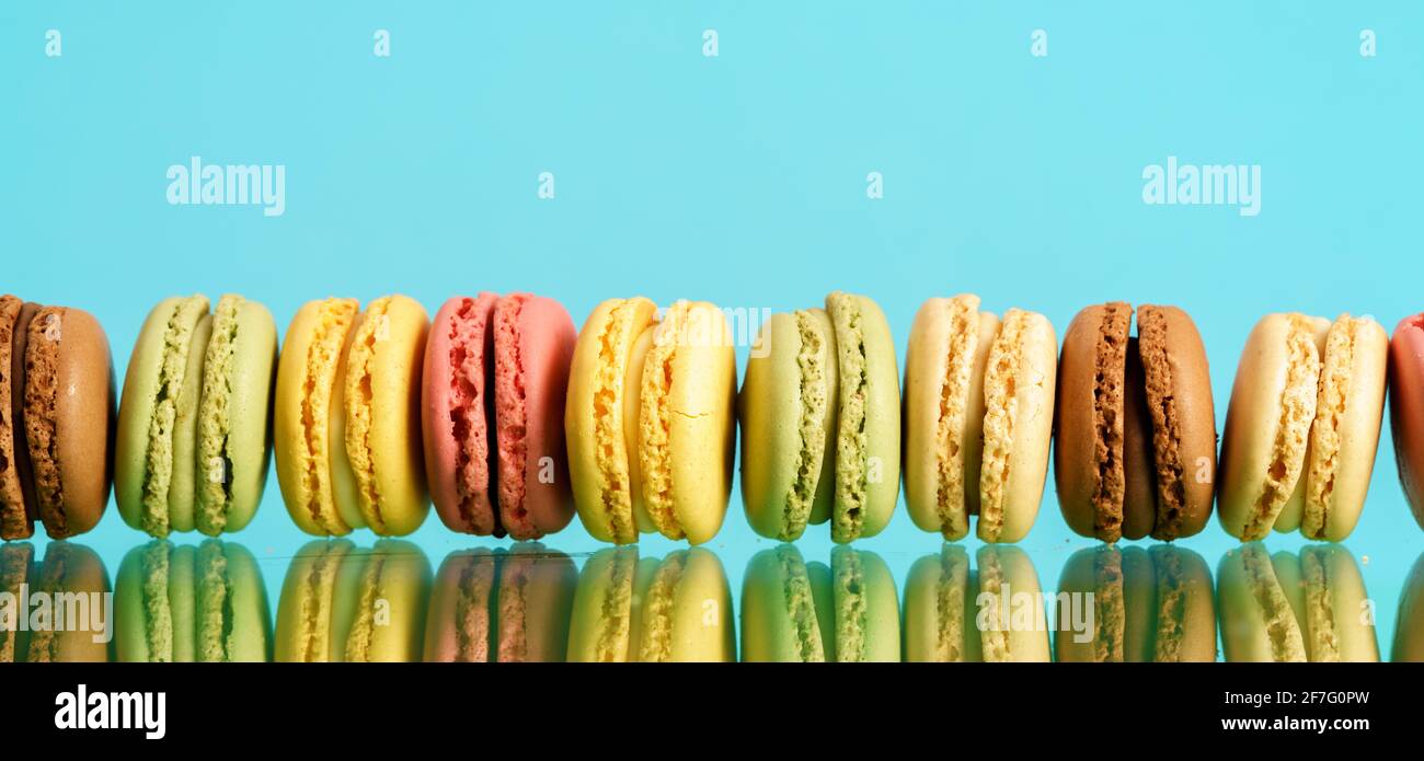 Macaron. Macaroons  Cakes. Colorful french macarons on background Stock Photo