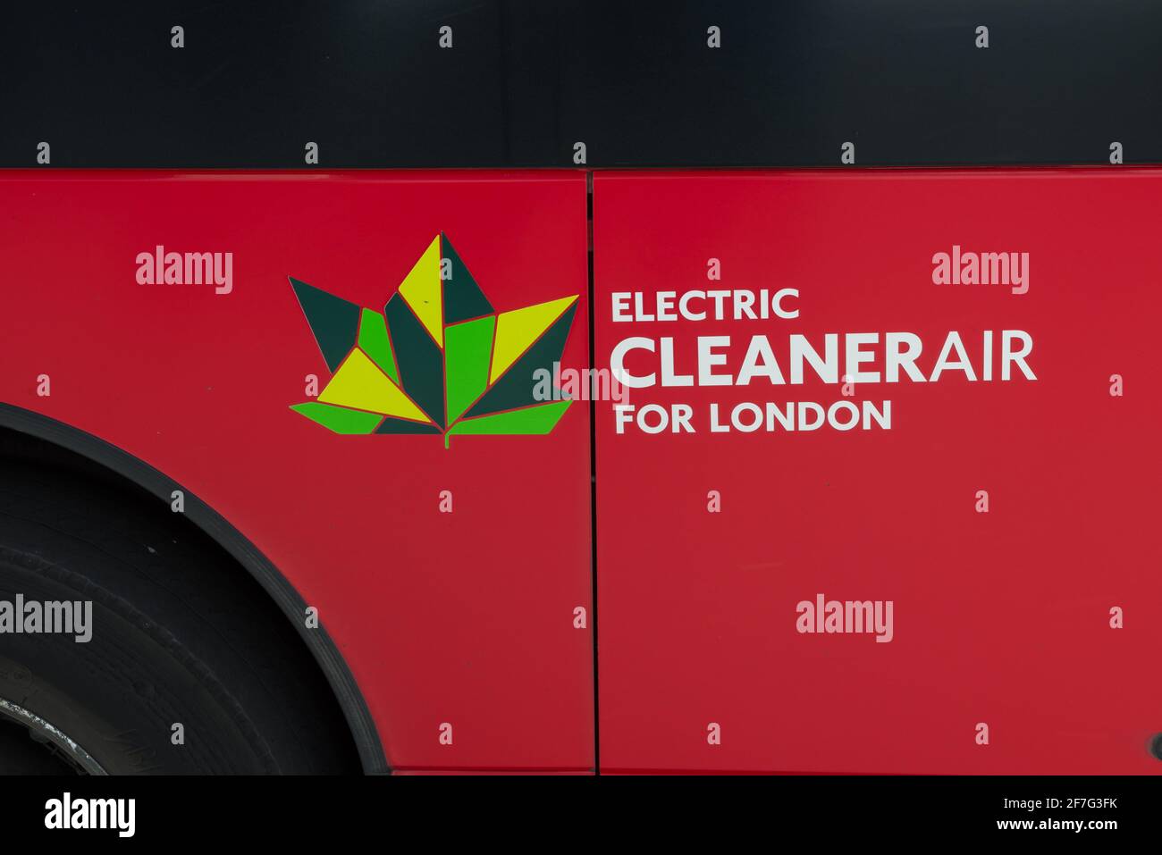 Cleaner Air for London logo and caption on side of an electric powered London bus. Stock Photo