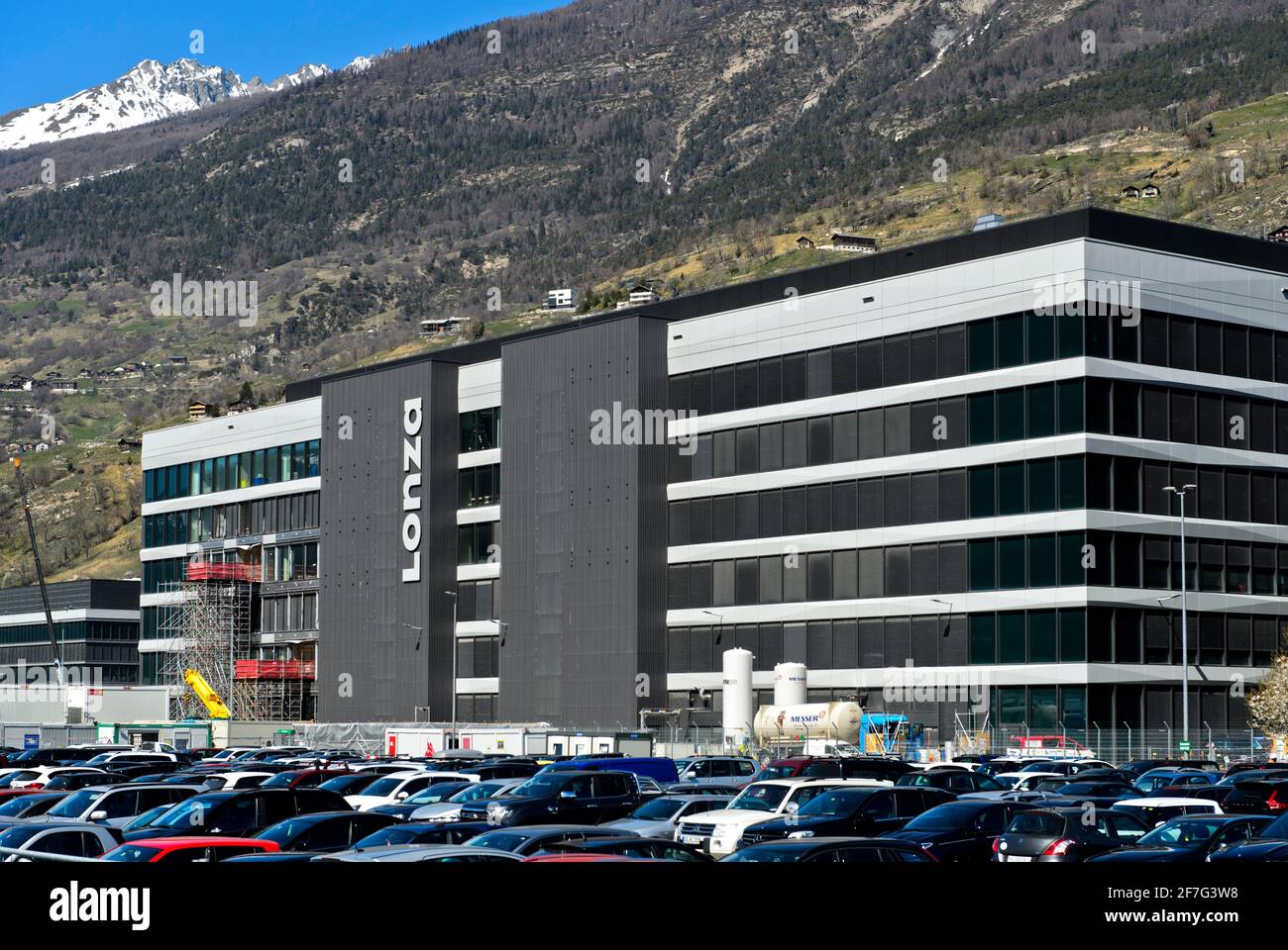 Bio-manufacturing complex Ibex Solutions of the Lonza Group AG for the research and production of corona vaccines, Visp, Valais, Switzerland Stock Photo