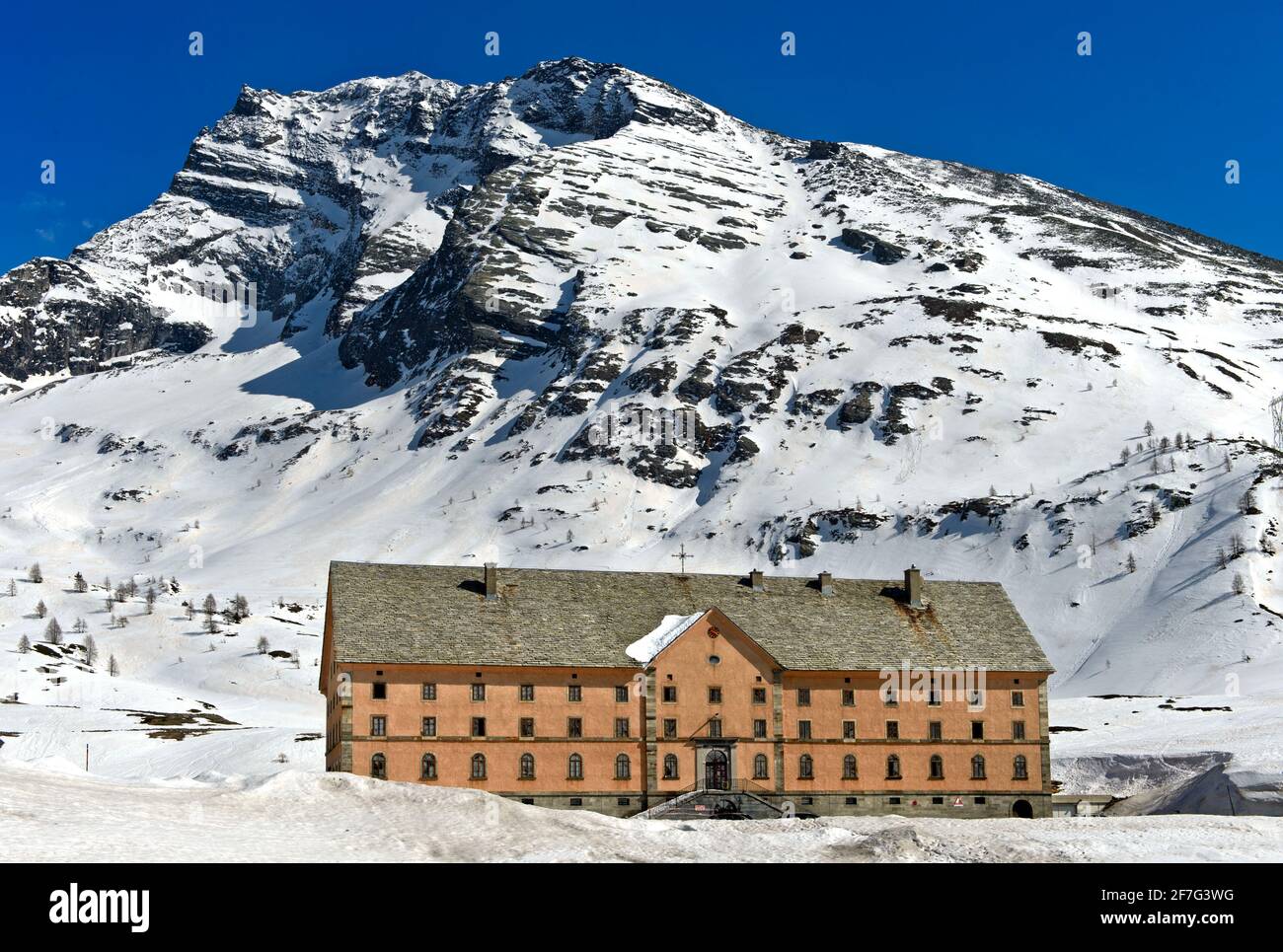 Simplon hospice on the Simplon Pass in winter, Valais, Switzerland Stock Photo