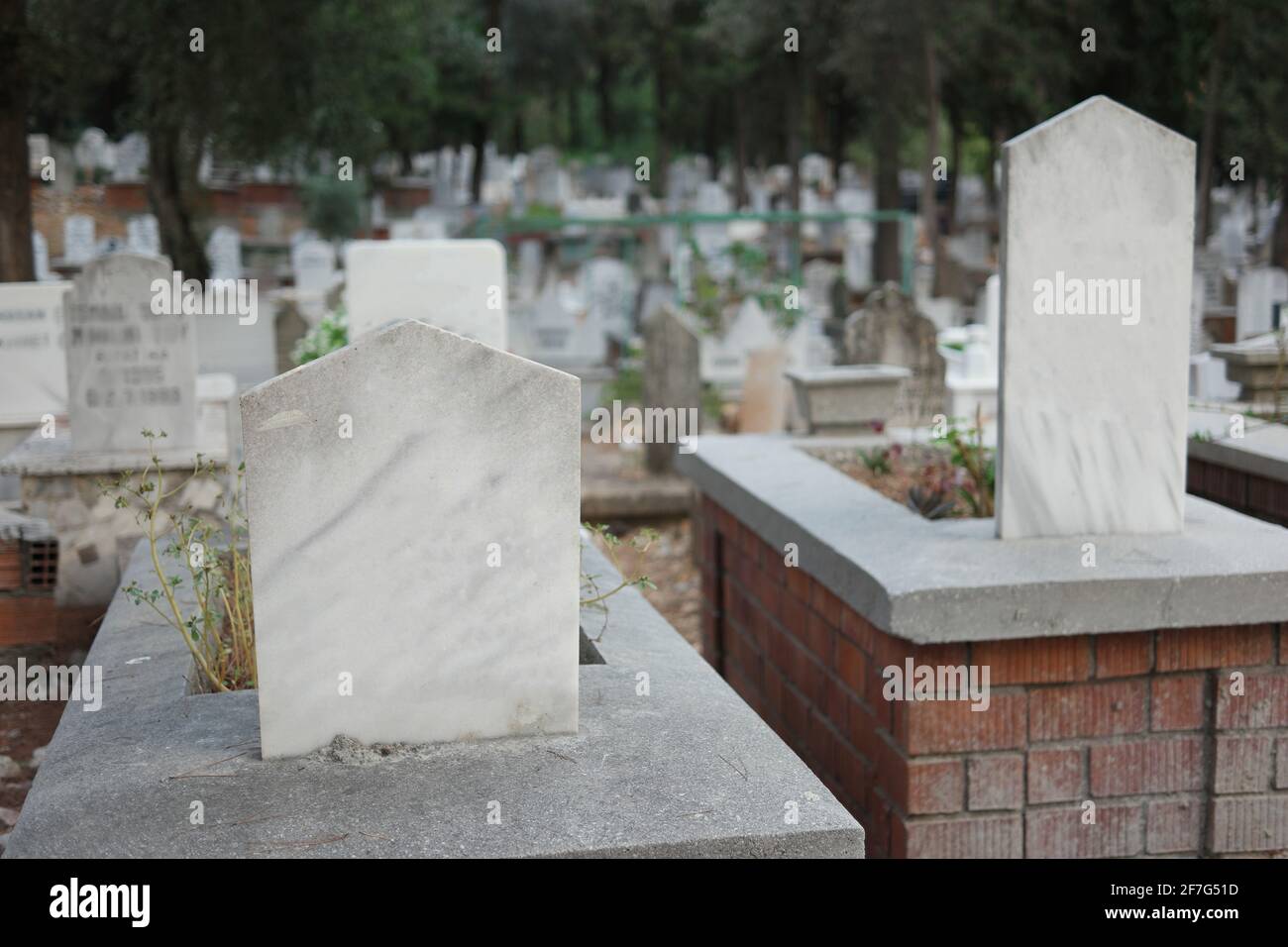 Graves and headstones at Muslim cemetery. Graves background Stock Photo