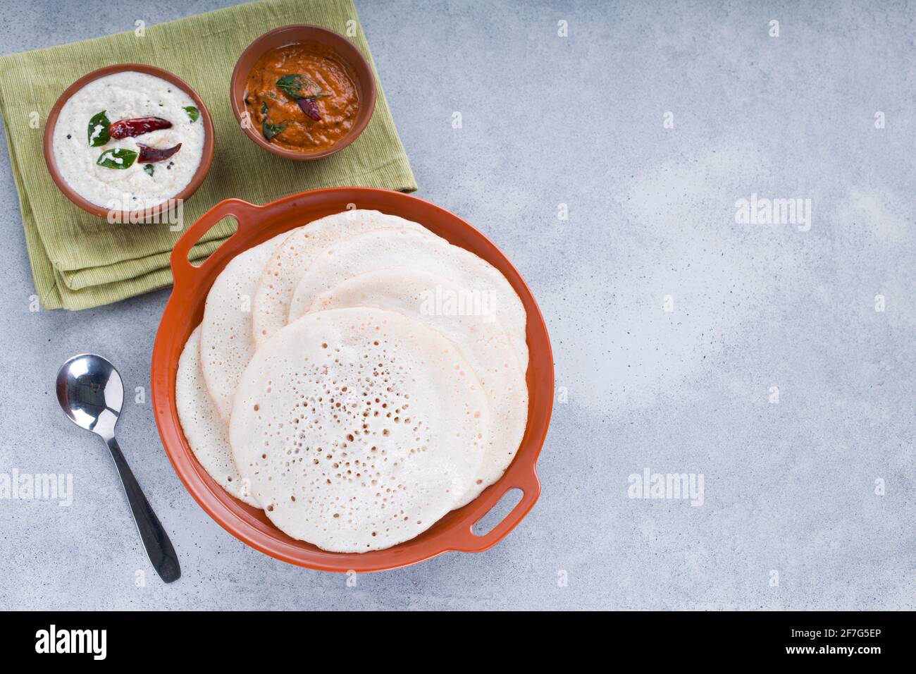 South Indian traditional breakfast Dosa or Thattu dosa made using cast