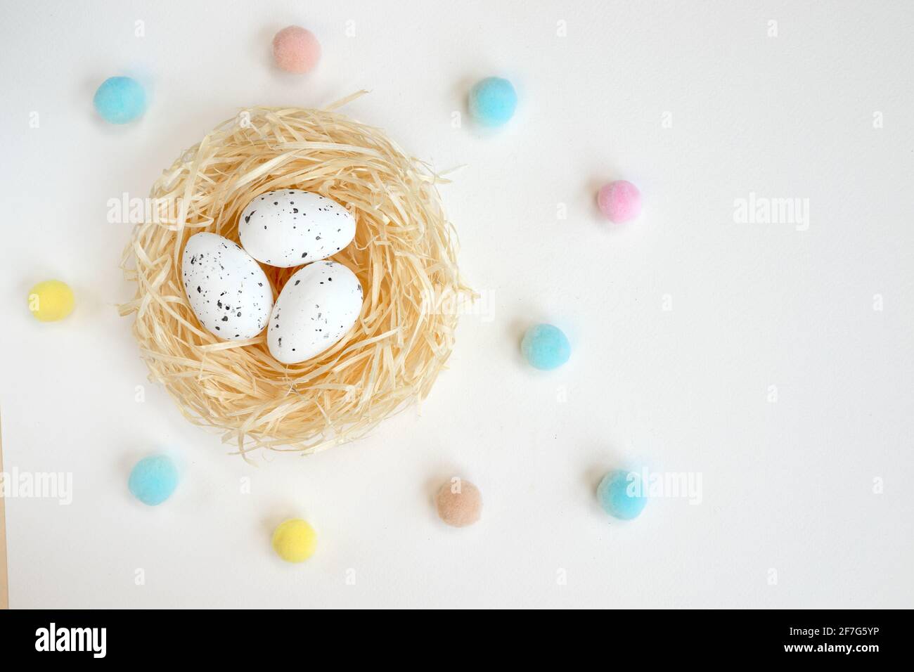 Easter eggs in the nest isolated on a white background with copy space ...