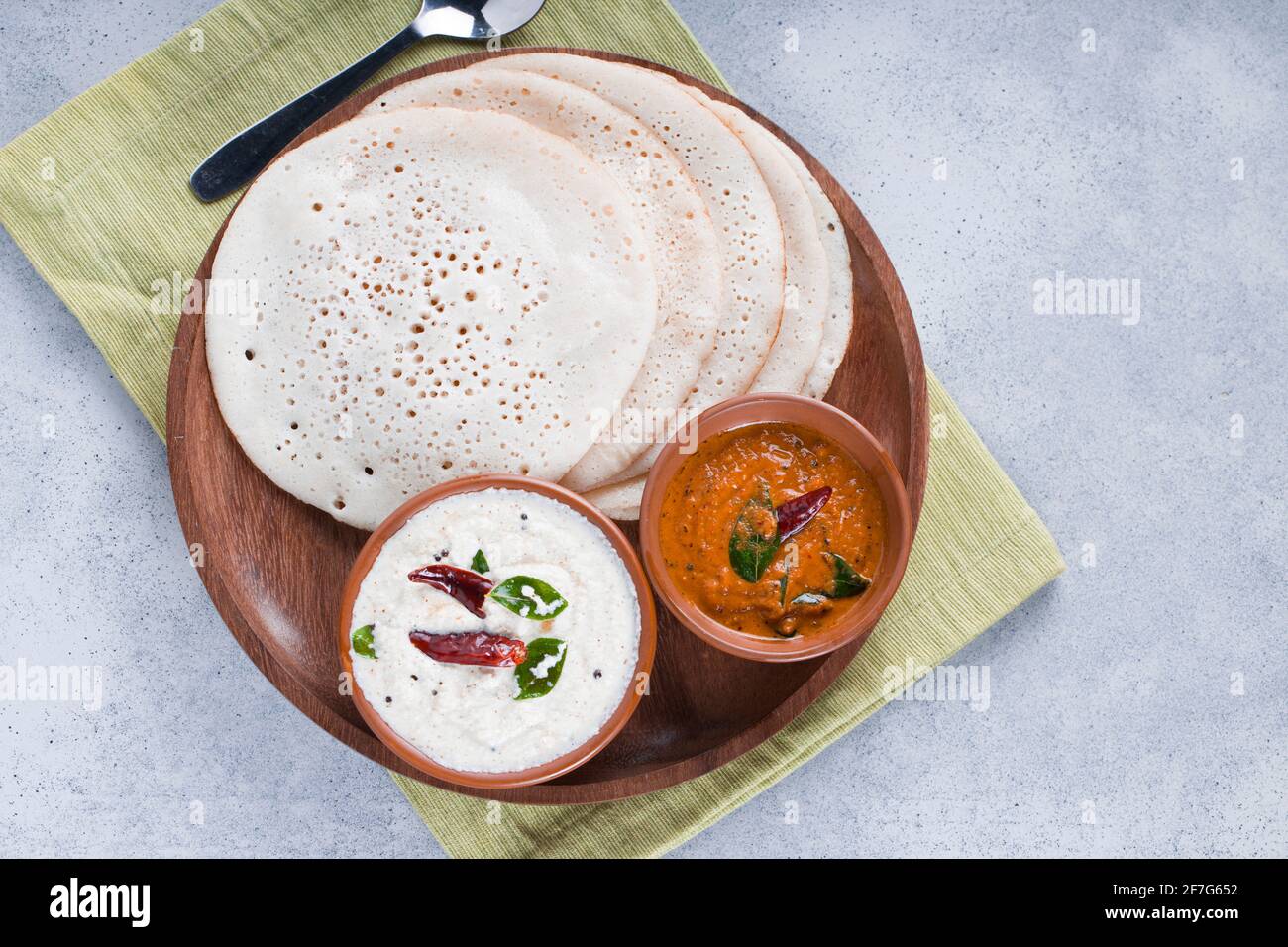 South Indian traditional breakfast Dosa or Thattu dosa made using cast