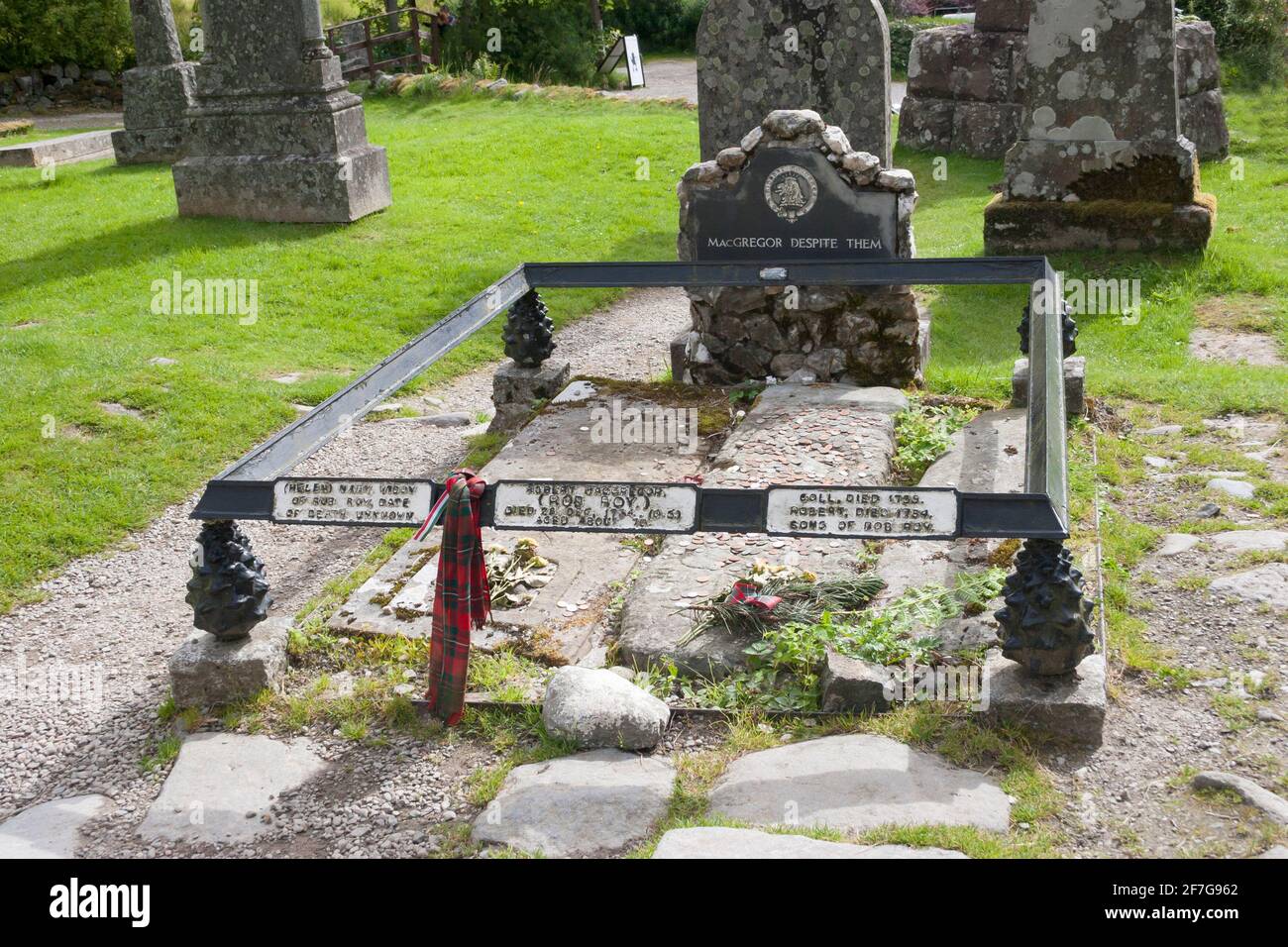 Grave of Rob Roy McGregor at Balquidder Parish Church graveyard, Stirlingshire, Scotland. Buried along side is the grave of his wife, Helen, and his s Stock Photo