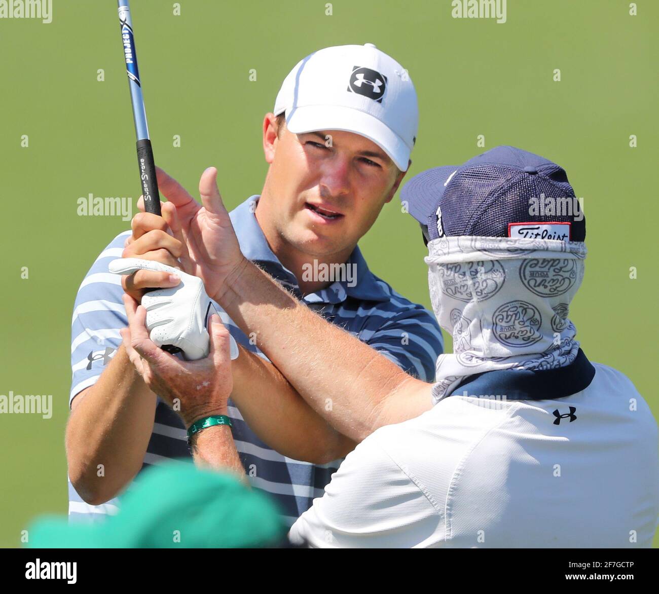 Augusta, USA. 05th Apr, 2021. A day after winning the Valero Texas Open, Jordan Spieth works with his swing doctor Cameron McCormick, getting in some work for the Masters on the practice range at Augusta National Golf Club on Monday, April 5, 2021, in Augusta, Georgia. (Photo by Curtis Compton/Atlanta Journal-Constitution/TNS/Sipa USA) Credit: Sipa USA/Alamy Live News Stock Photo