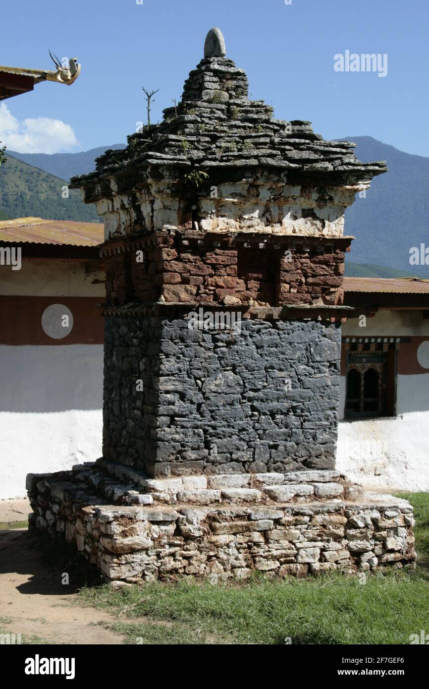 Black shorten Memorial place of prayer in the Kingdom of Bhutan  illuminated Asia Himalayas Buddha statue stairs holy place stoned Stock Photo