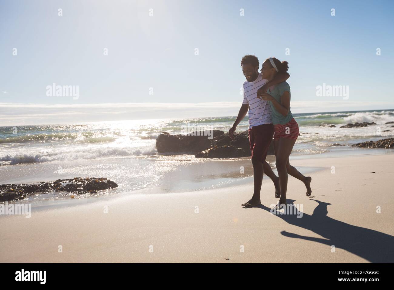 Walking on the beach african american hi-res stock photography and ...