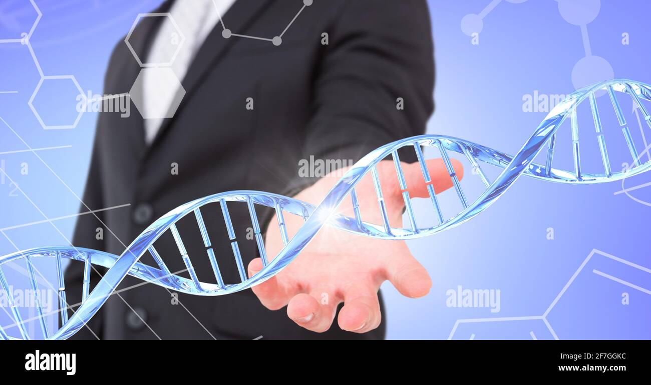 Dna structure and chemical structures over mid section of business man with cupped hand Stock Photo