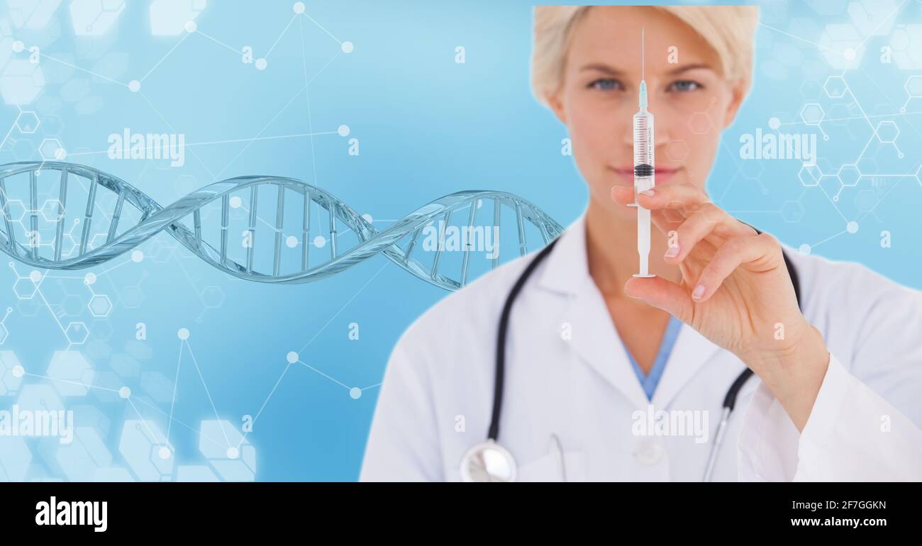 Caucasian female doctor holding a syringe against dna structure and network of connections Stock Photo