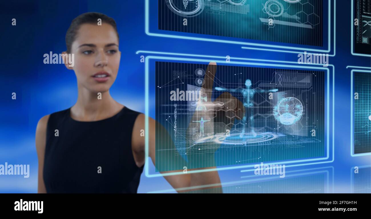 Composition of data processing over caucasian woman in background Stock Photo