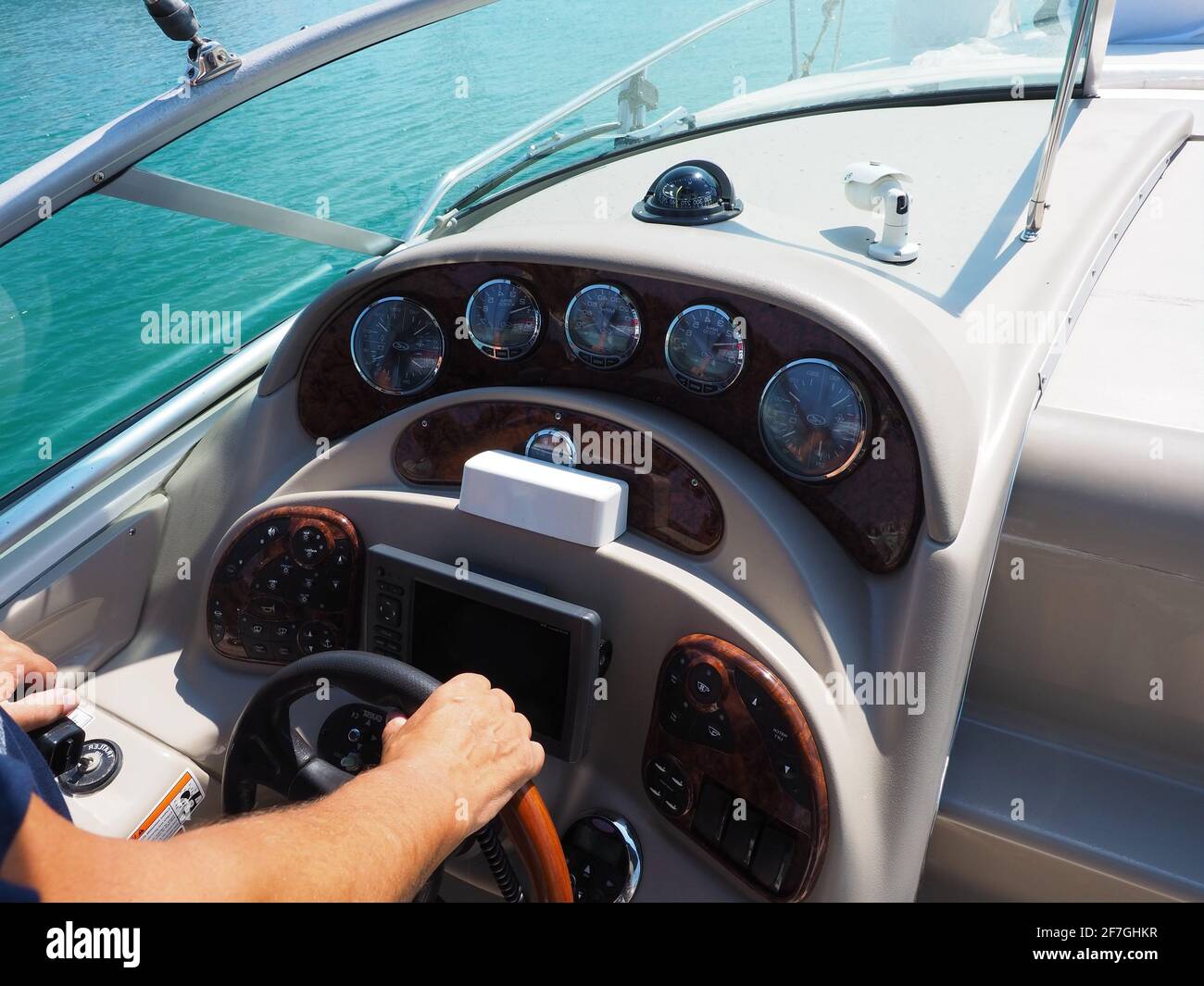 Russia, Sochi 20.07.2020. Male hand holding steering wheel on dashboard ...