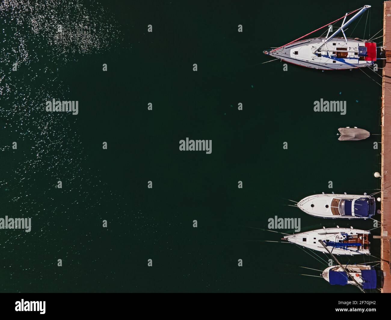 Aerial view of colorful boats in the marine Stock Photo - Alamy