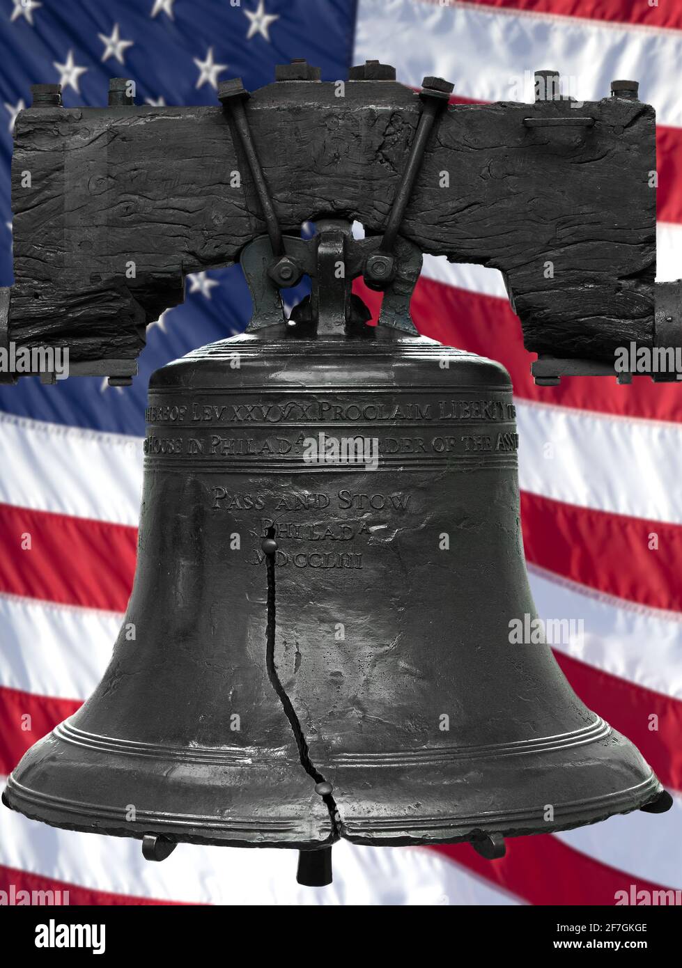 Isolated statue of the authentic Liberty Bell, Philadelphia, PA. The United States flag was digitally added to the background. Stock Photo