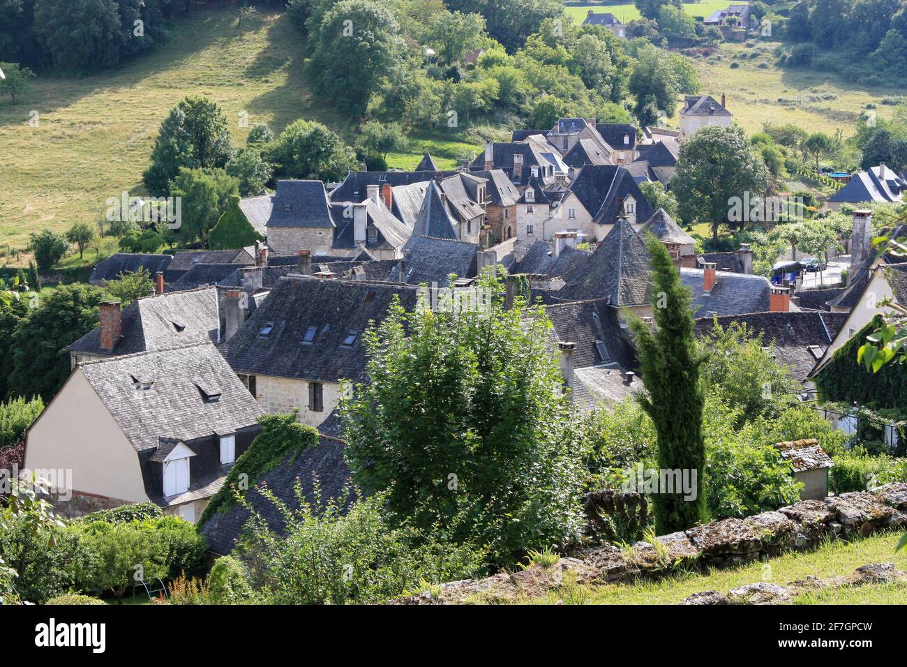 Turenne, Correze, France, lower village at sunrise with its stone