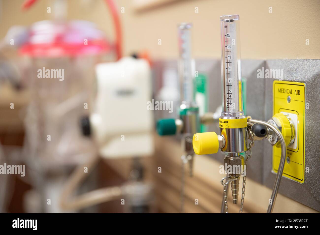 wall in a hospital room with both oxygen and medical air on tap Stock
