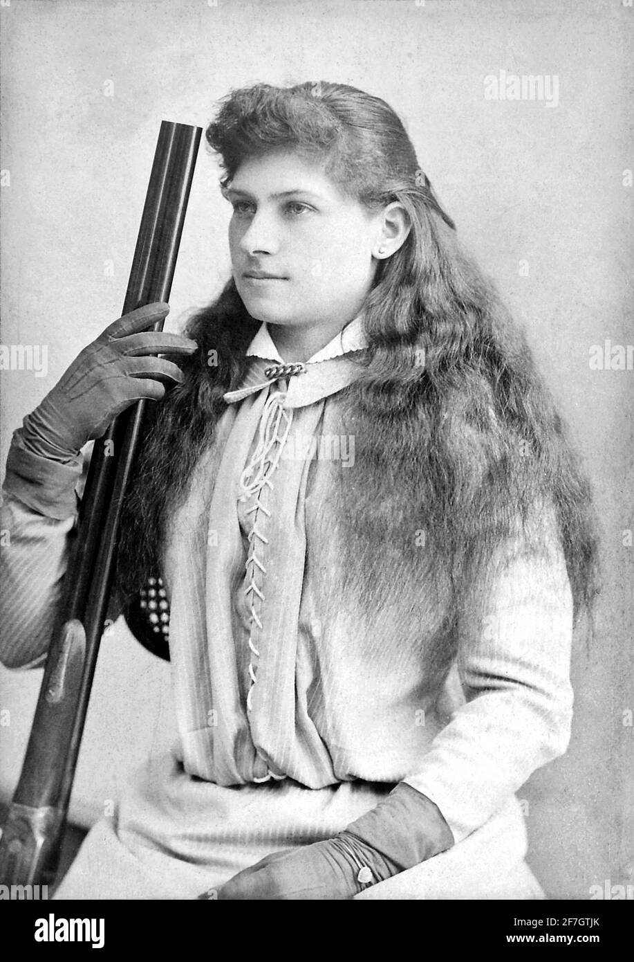 Annie Oakley. Portrait of the famous American sharpshooter, Annie Oakley  (b. Phoebe Ann Mosey, 1860-1926) , c. 1880. Stock Photo