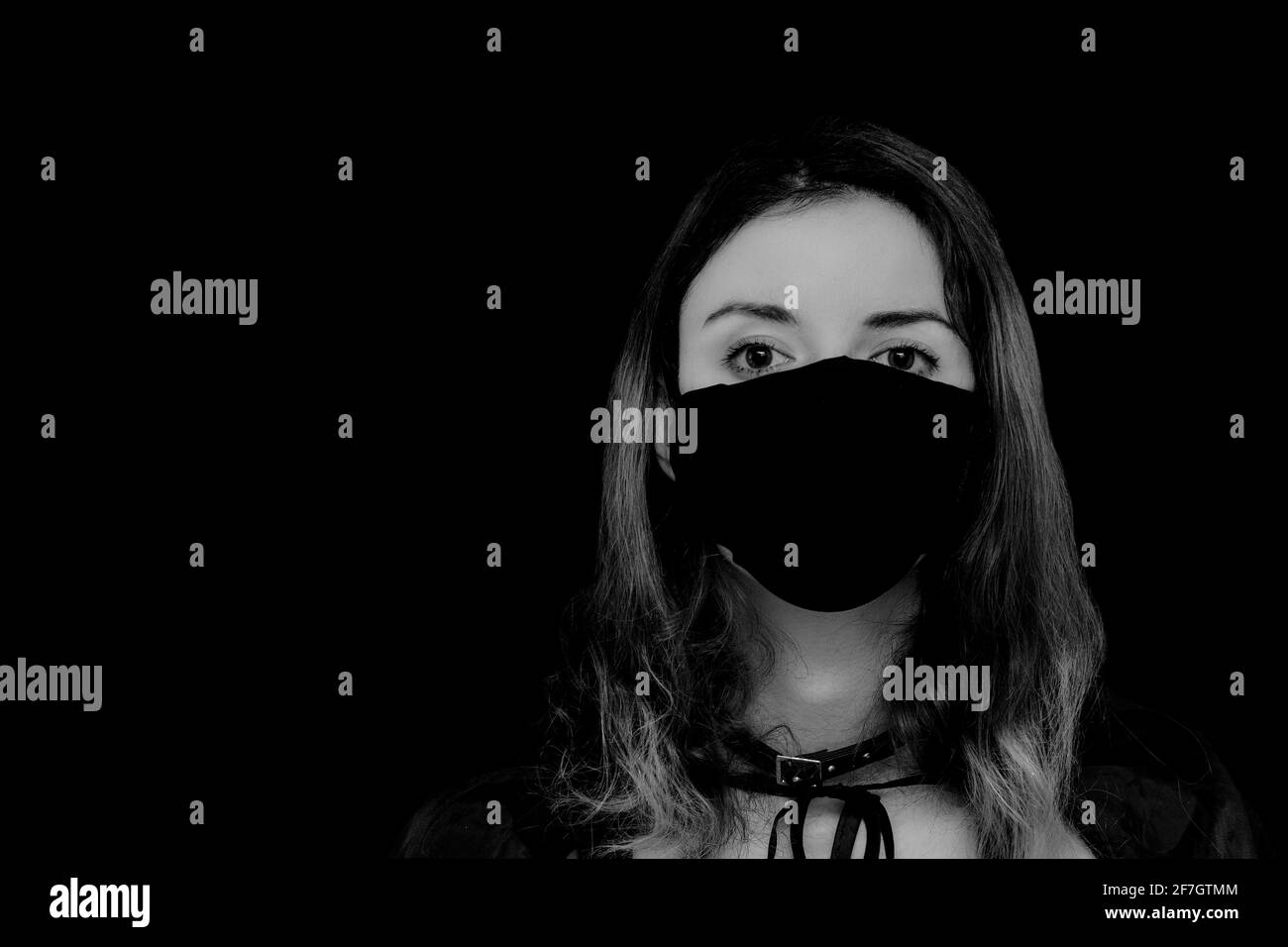 Black and white self portrait of a girl with a mask on Stock Photo - Alamy