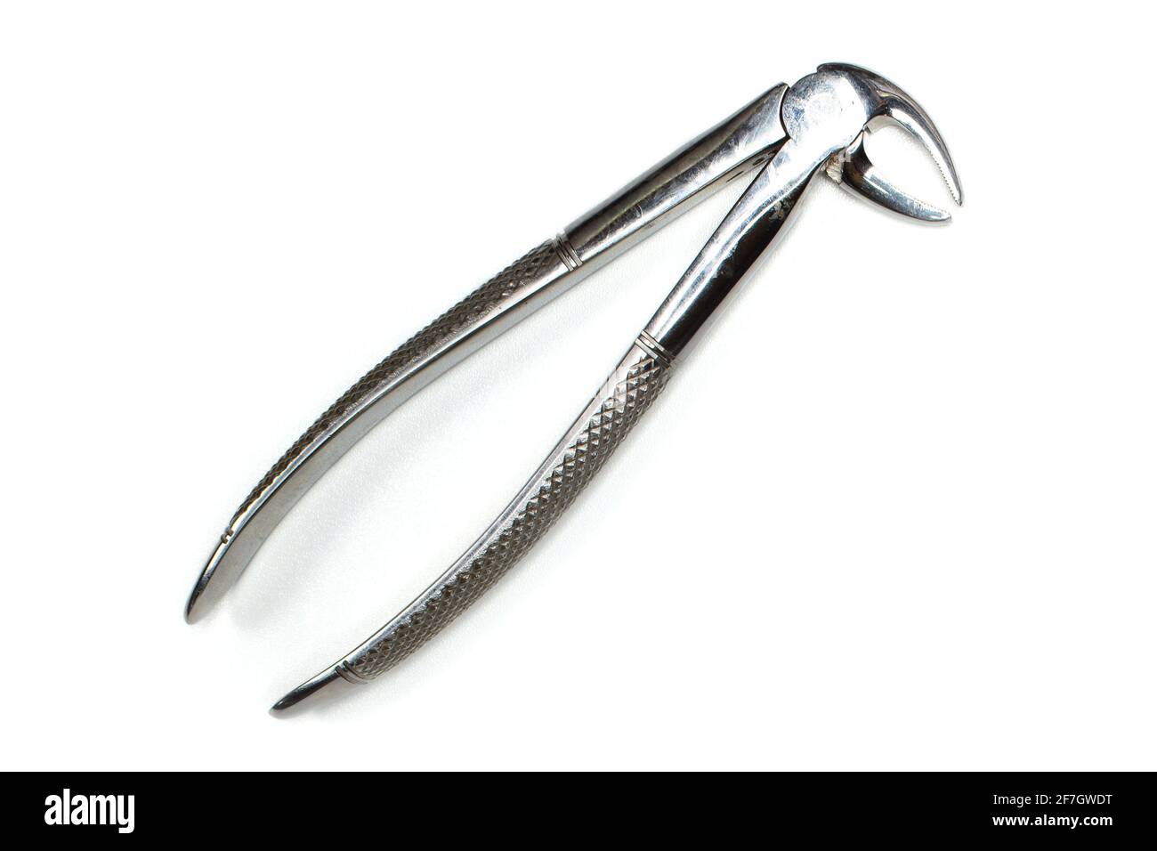 Used real dental forceps from equipment tools. Isolated on white