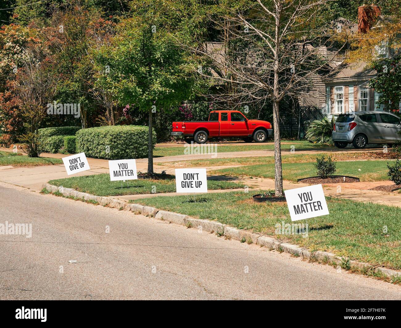 Concept of you matter, don't give up hope with signs of encouragement along a road in Montgomery Alabama, USA. Stock Photo