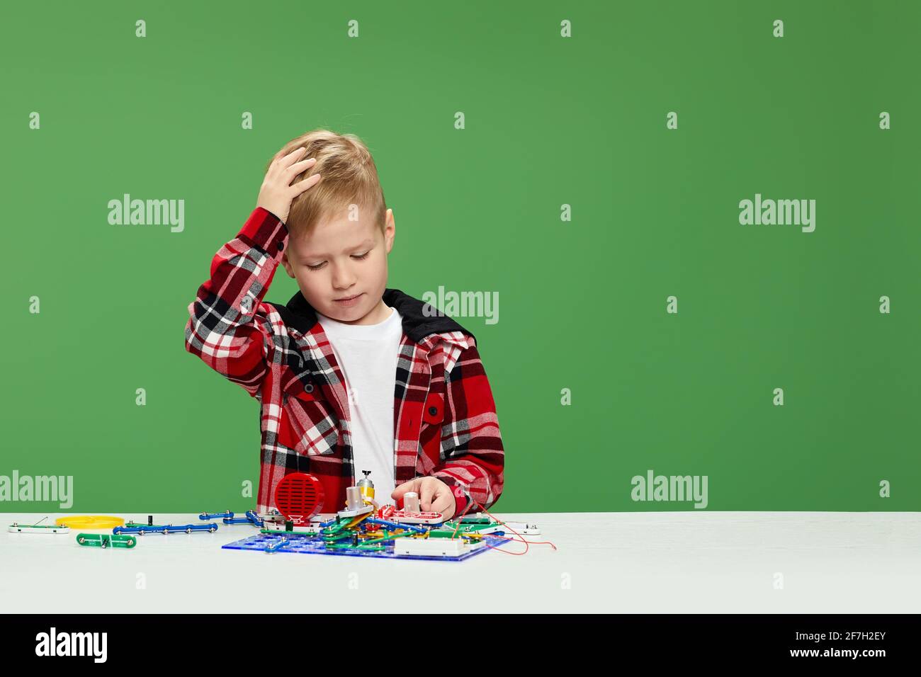 children playing with electronic constructor at studio Stock Photo