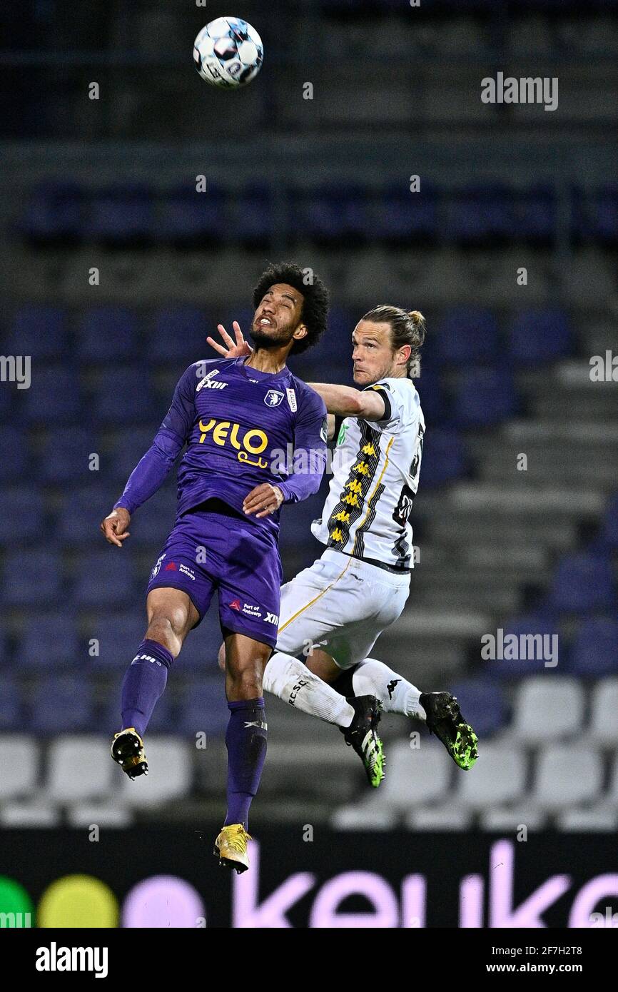 Beerschot's Ryan Sanusi and Charleroi's Guillaume Gillet fight for the ball during a postponed soccer match between Beerschot VA and Sporting Charlero Stock Photo