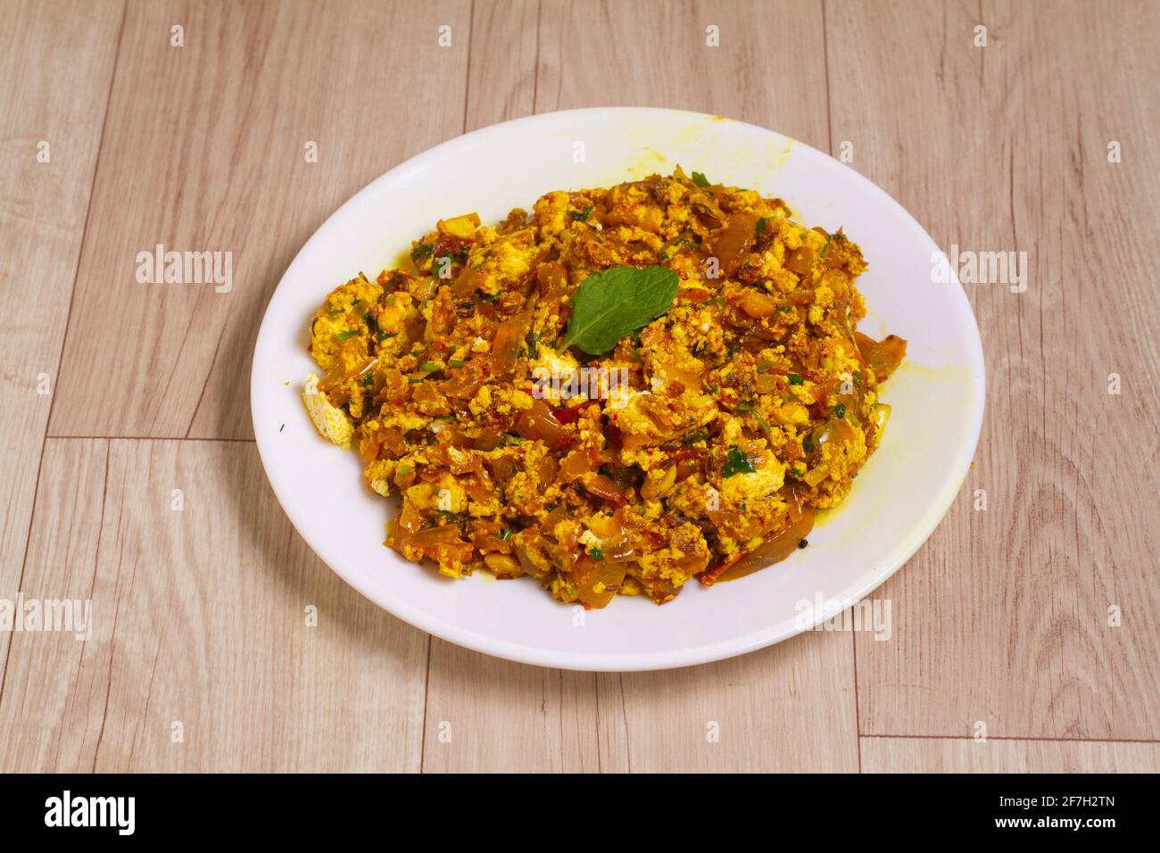 Paneer Bhurji, mildly spiced cottage cheese scramble and served, selective focus Stock Photo