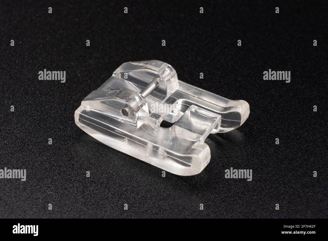 Pearls and sequins foot for electronic sewing machine Stock Photo Alamy