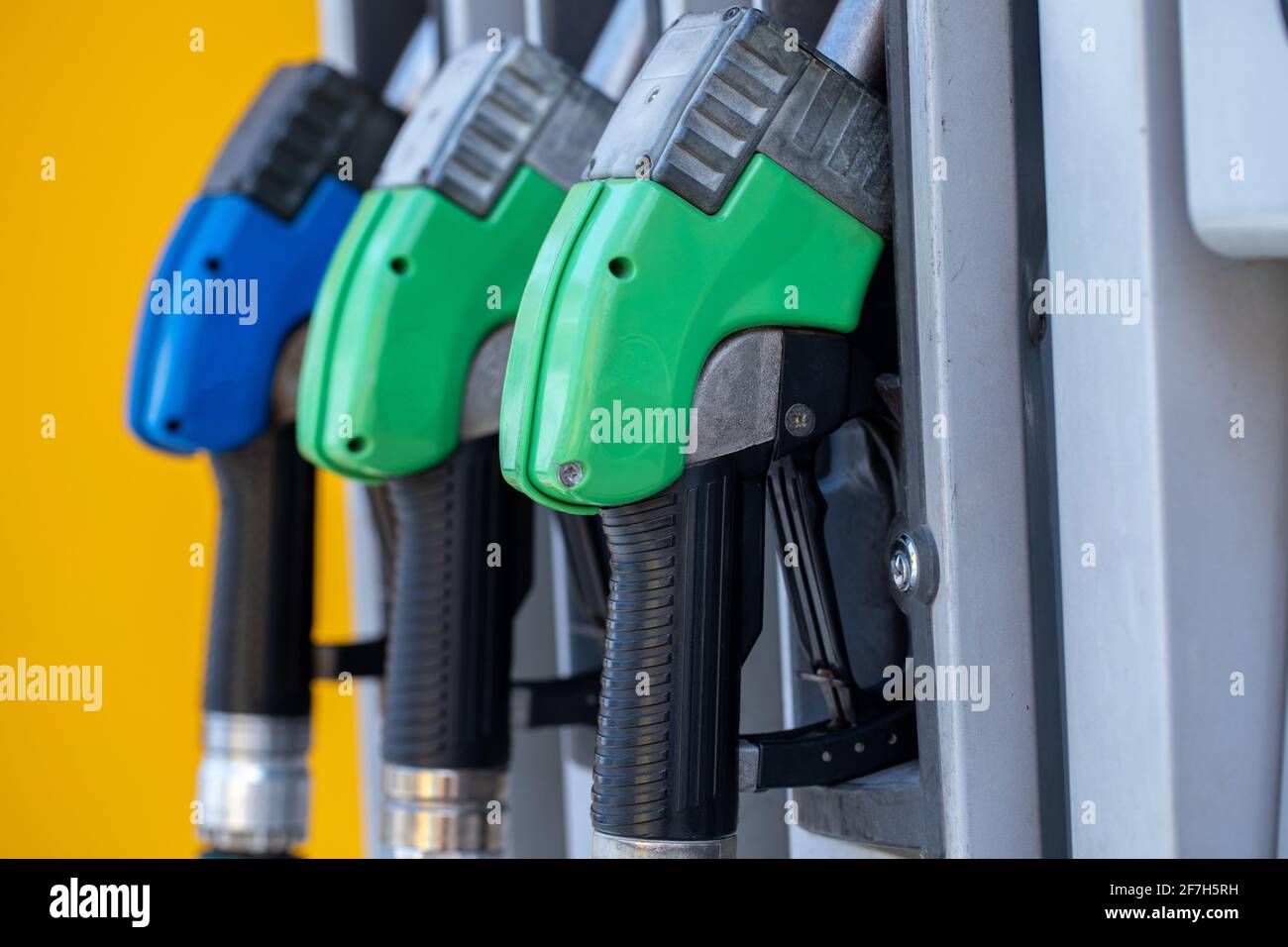 Fuel pumps at a gas station. Color fuel gasoline dispenser. Stock Photo