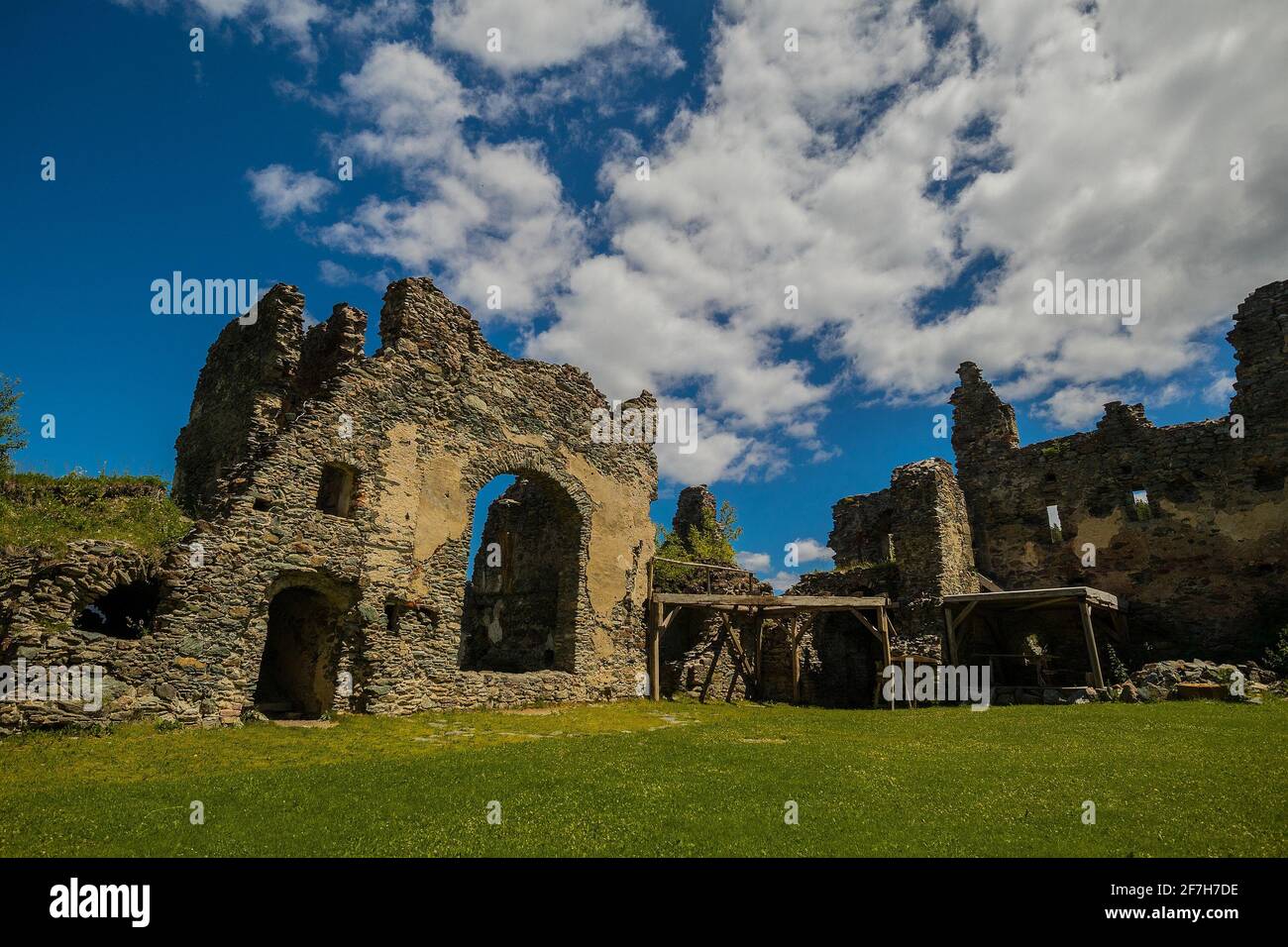 Inside of Steinschloss castle ruins rising above the mura valley in styria, Austria. Medieval ruins in Austria on a sunny day, walls are being torn do Stock Photo