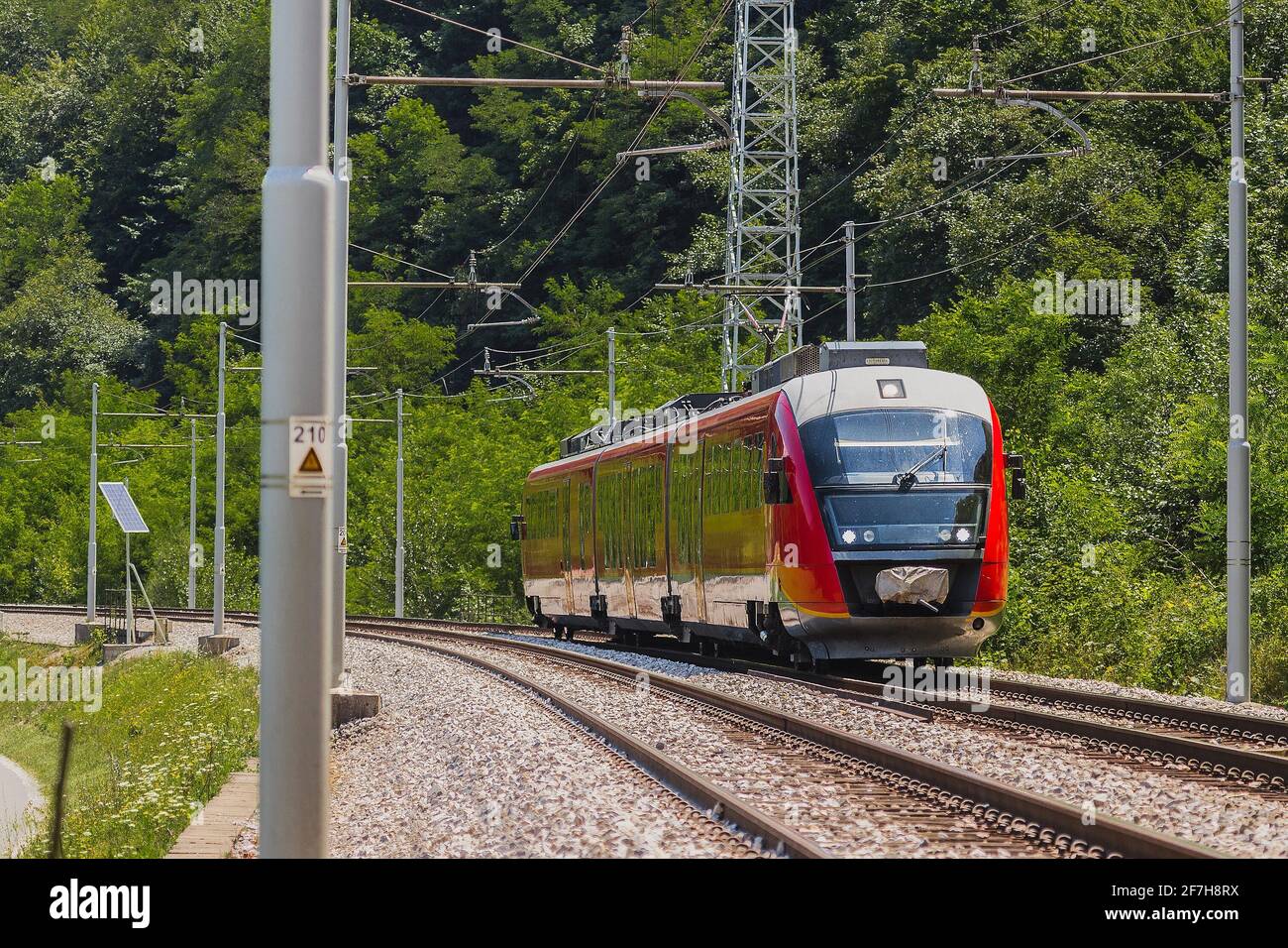 Modern electrical multiple unit train on an open track. Commuter train
