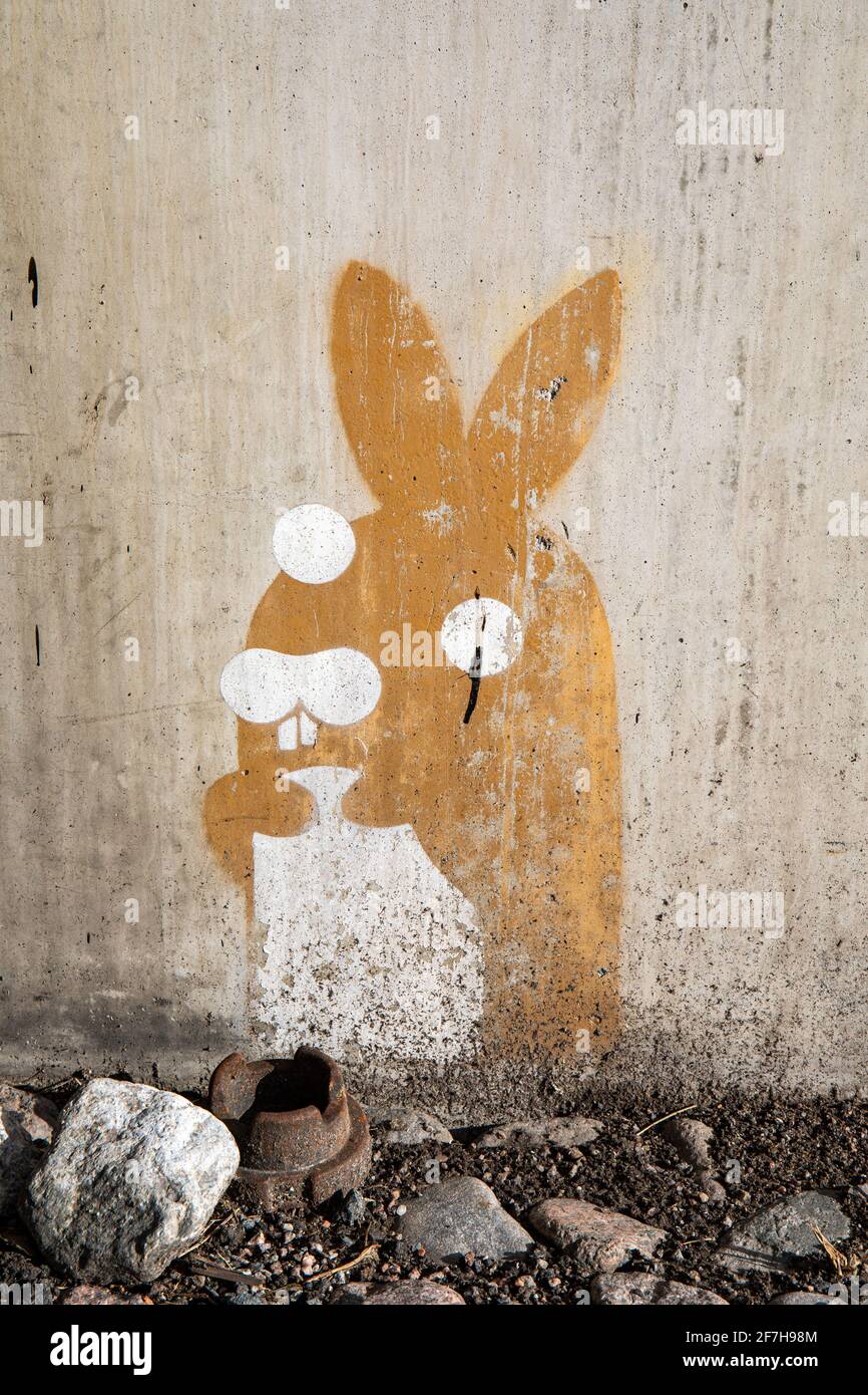Street art. Bunny mural on concrete wall. Stock Photo
