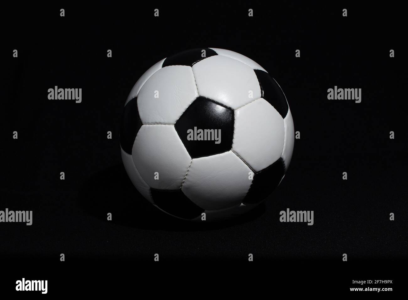 soccer ball detail on black background Stock Photo - Alamy