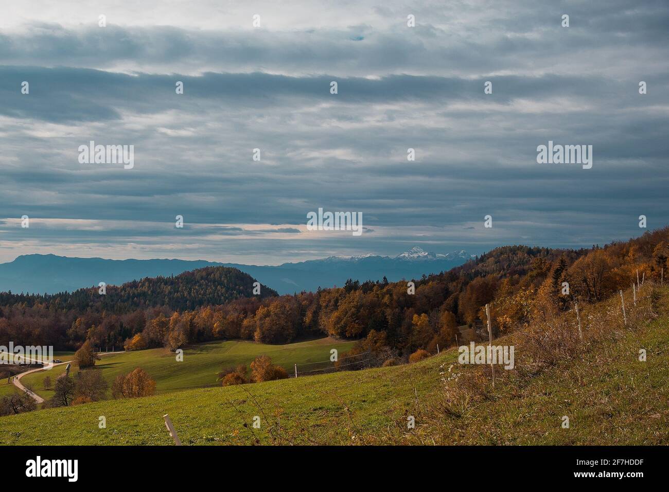 Autumn like meadows and beautiful sights towards the mountains in the distance. Stock Photo