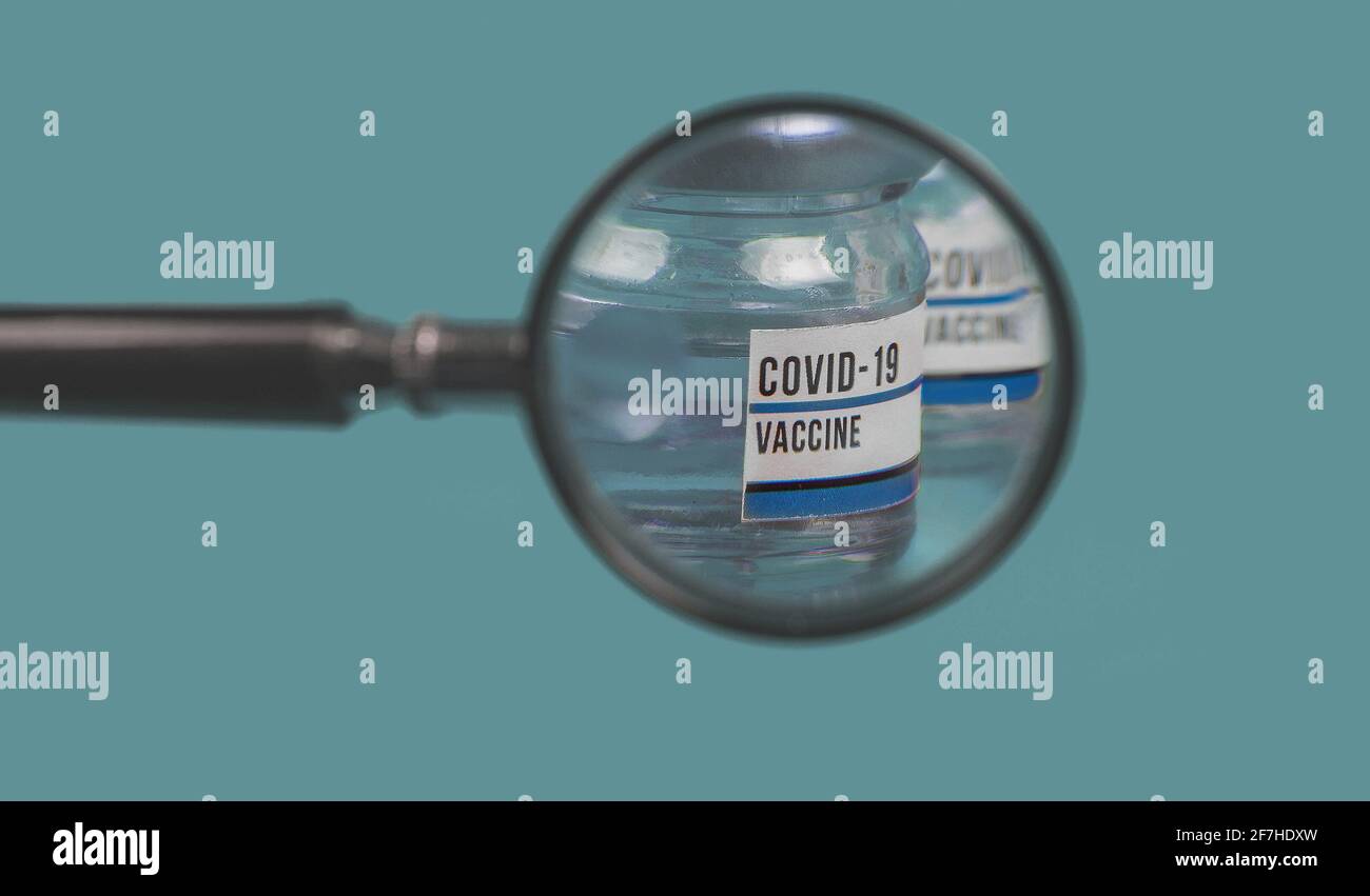 Questionable Covid 19 coronavirus vaccine. Are we ready for covid 19 vaccine, is it safe enough. Concept of safety of corona virus vaccine. Stock Photo