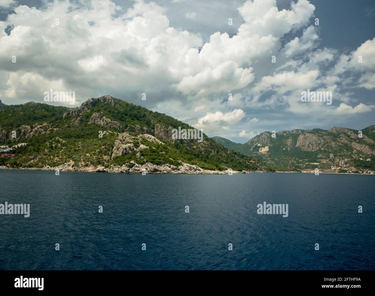 Lagoon in the background of hills and rocks Stock Photo - Alamy