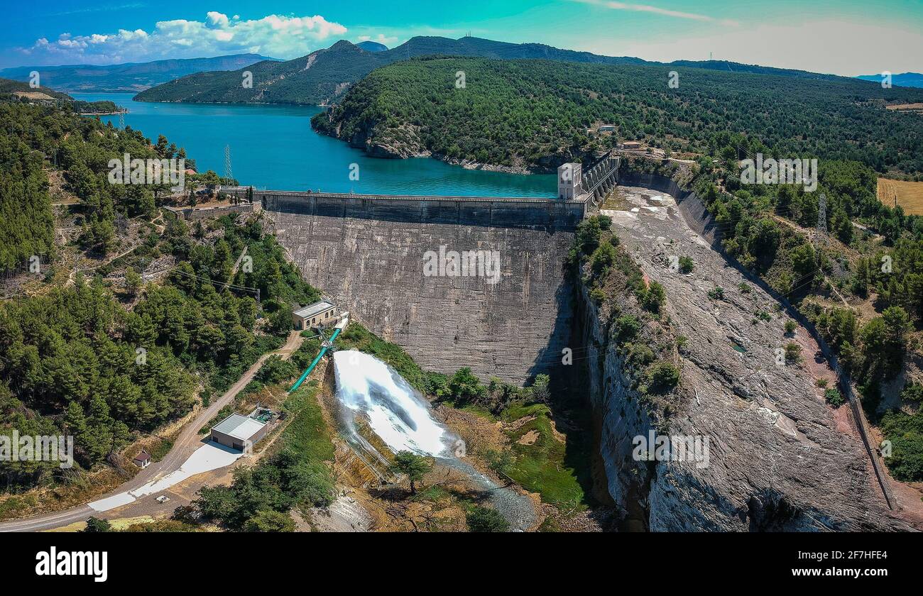 Drone panorama picture of hydroelectric power plant of Talarn, on the Talarn lake, close to the Tremp city in Catalunya, Spain on a sunny day. A lake Stock Photo