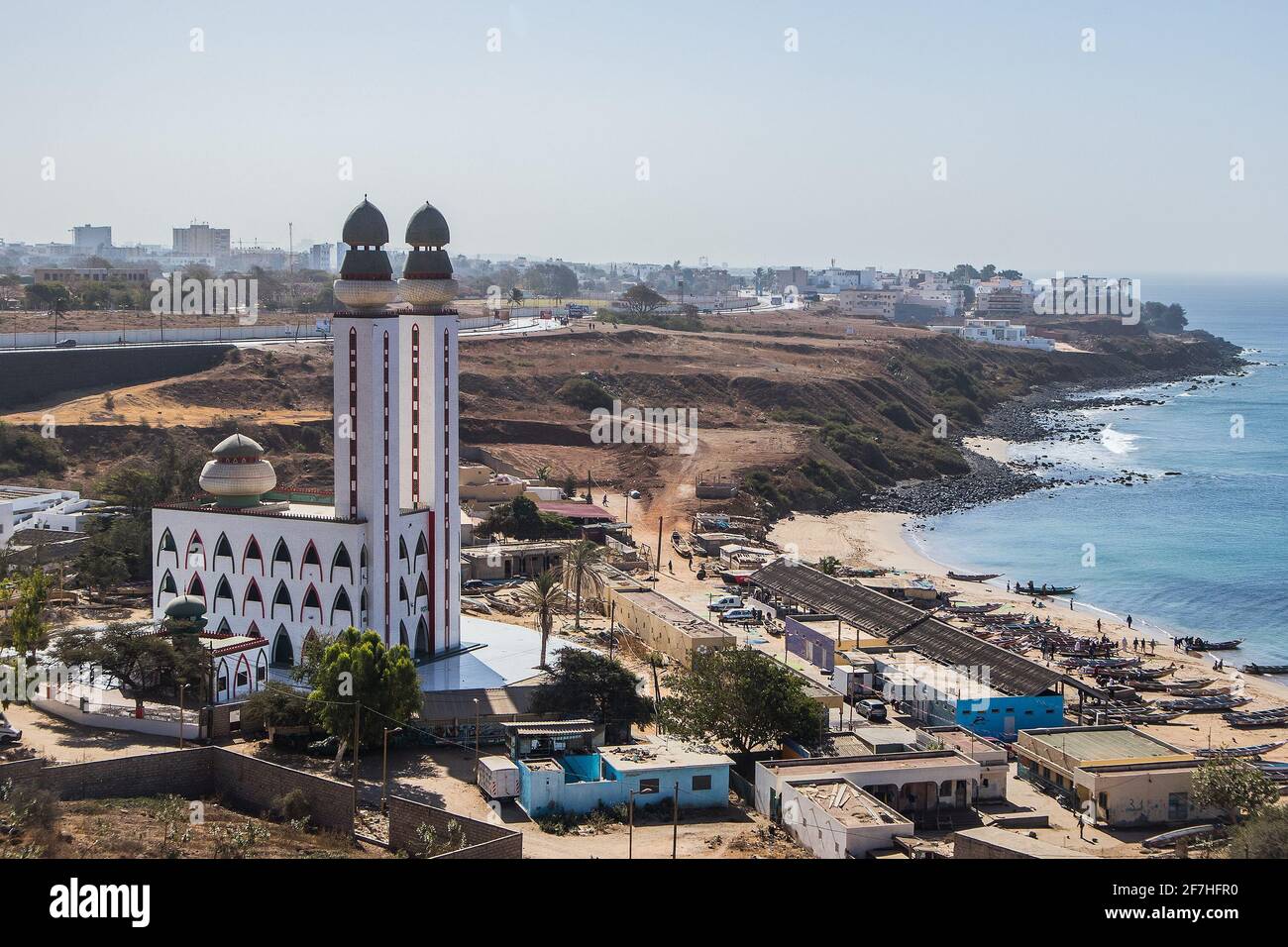 Mosque of divinity or mosquee de la divinite in Dakar, Senegal, viewed from a higher perspective on a sunny day. City of Dakar in the background. Stock Photo