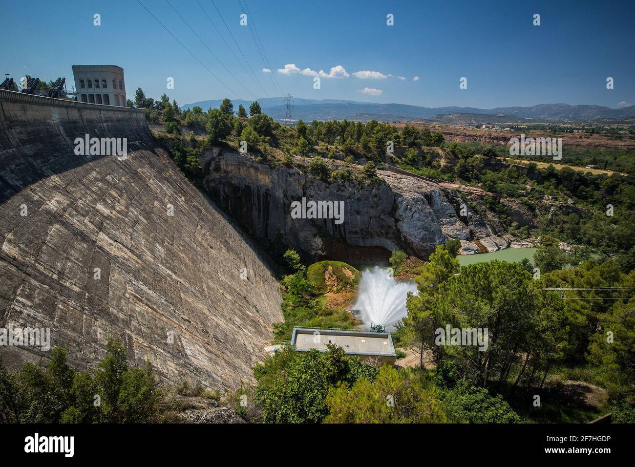 Panorama picture of a dam of hydroelectric power plant of Talarn, on the Talarn lake, close to the Tremp city in Catalunya, Spain on a sunny day. Stock Photo