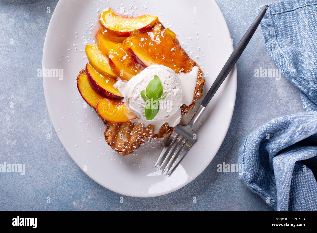 French toast with peaches and vanilla ice cream Stock Photo Alamy