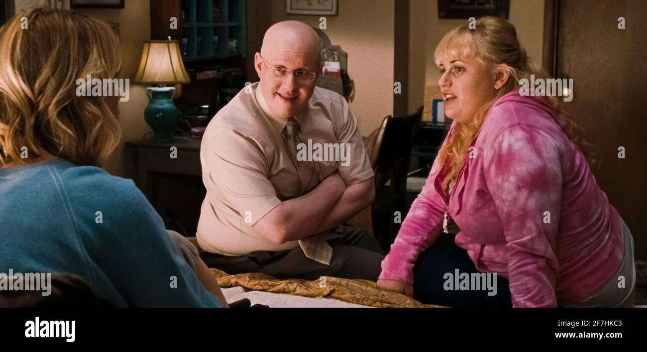 USA. Kristen Wiig , Rebel Wilson and Matt Lucas in a scene from the  (C)Universal Pictures film: Bridesmaids (2011). Plot: Competition between  the maid of honor and a bridesmaid, over who is