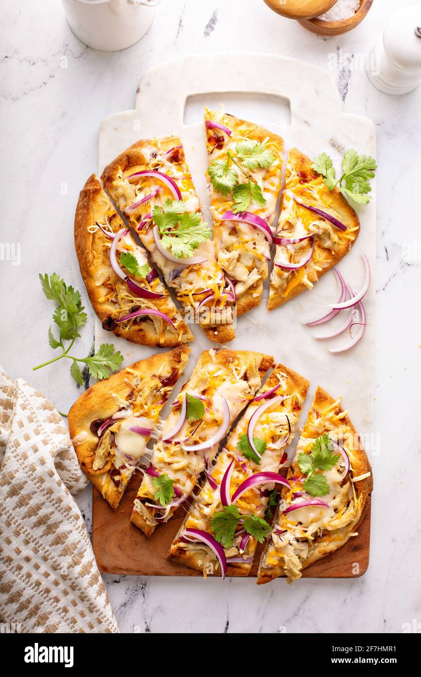 Barbecue chicken flatbreads with red onion Stock Photo